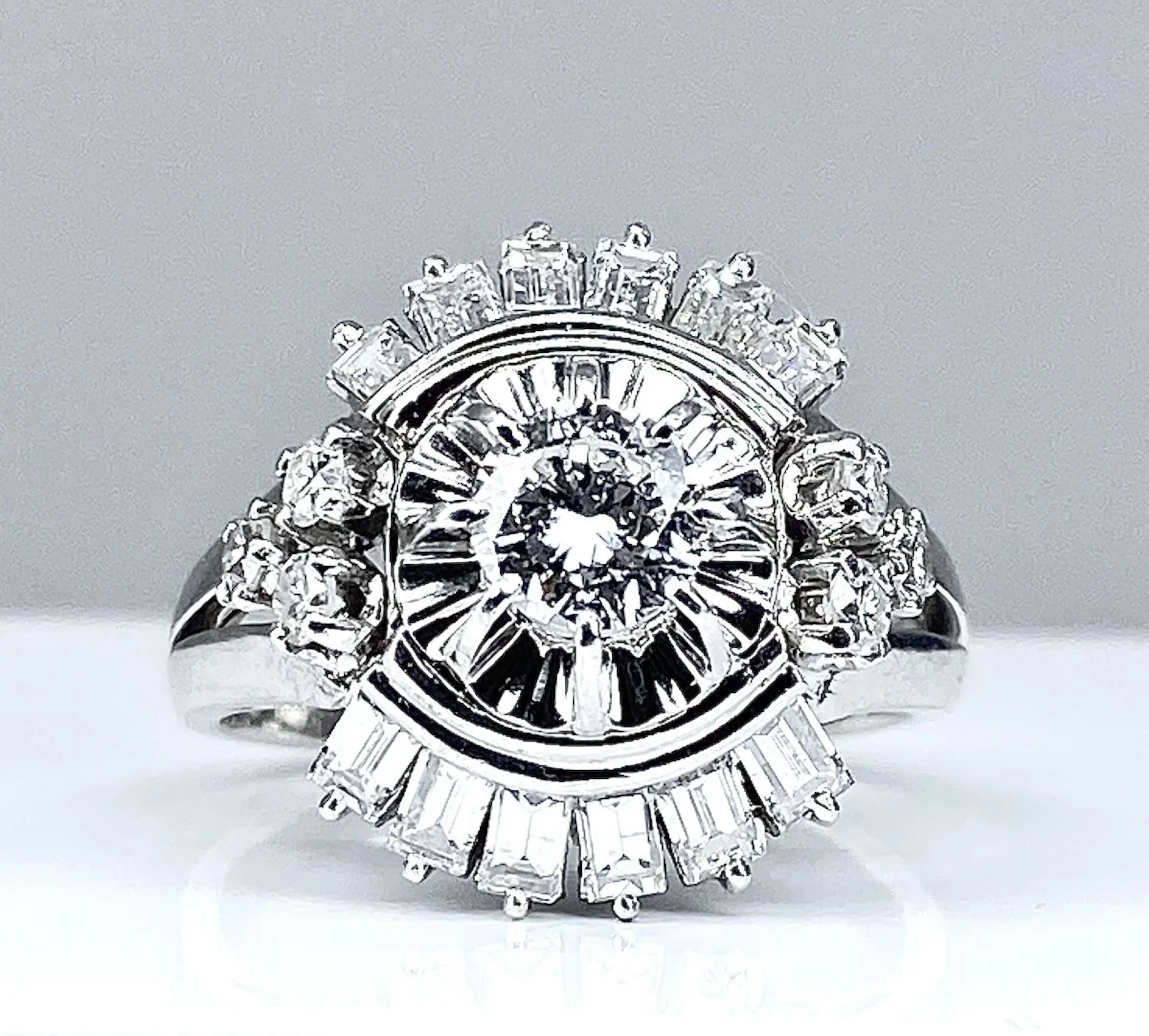 Magnificent platinum ring with baguette diamonds and round diamonds.