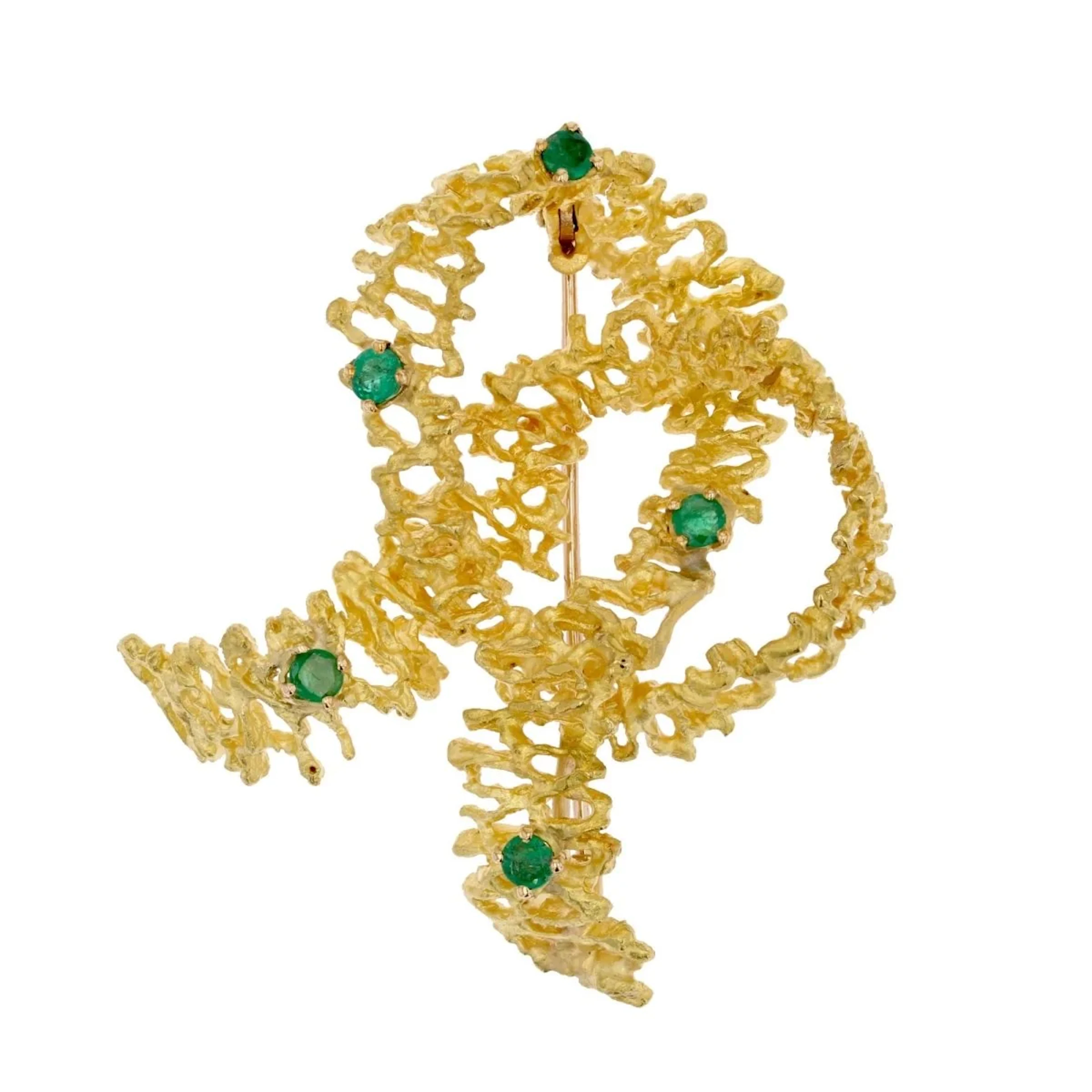 Gold and emerald brooch pin