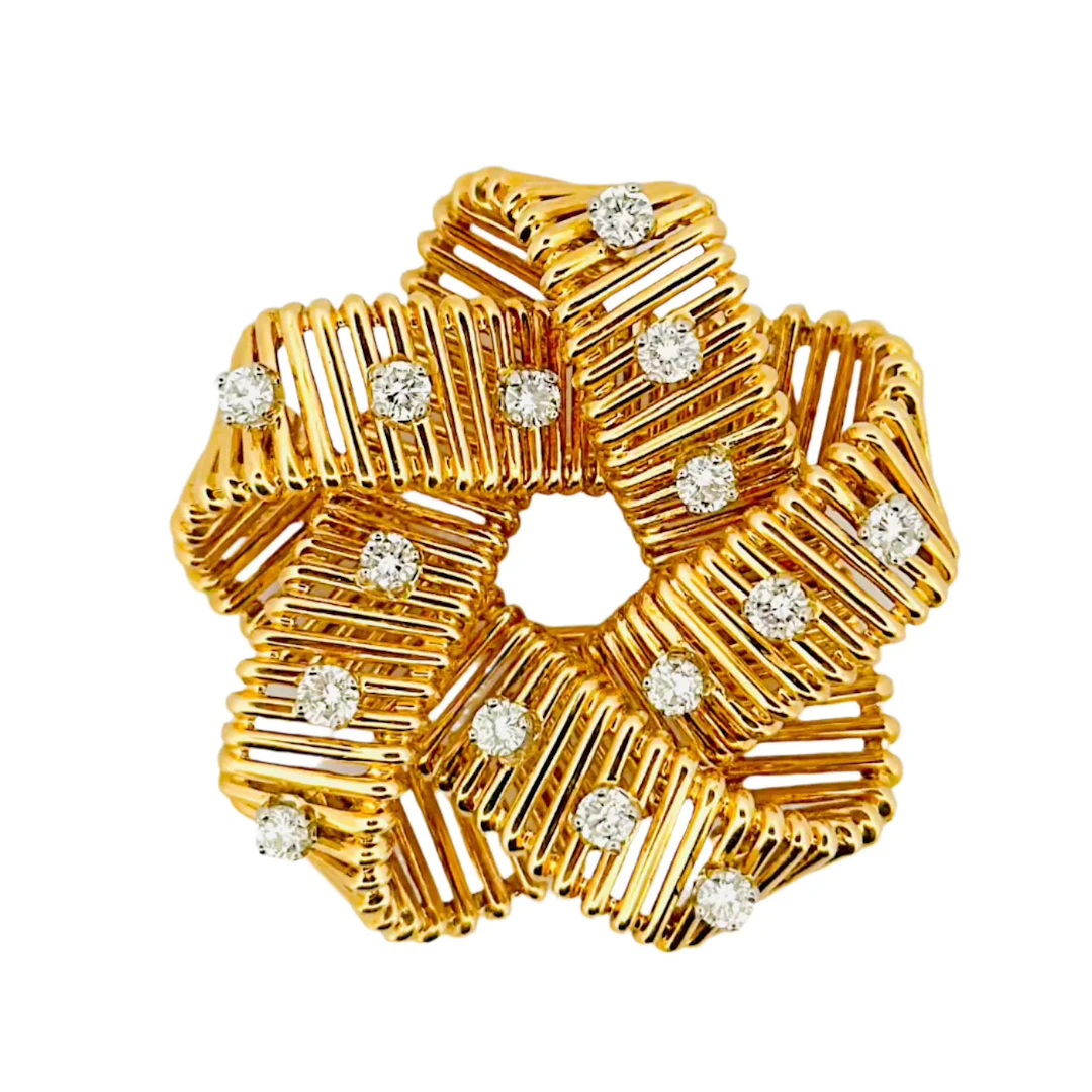 Brooch HERMES in yellow gold and diamonds