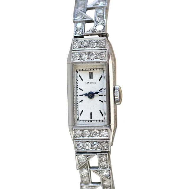 Montre LONGINES en platine, acier et diamants