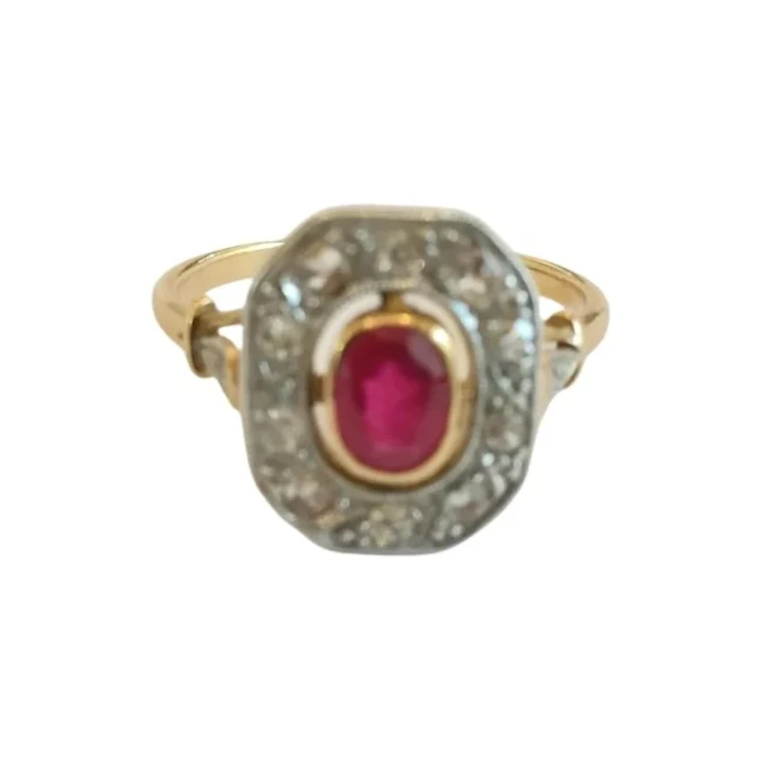 Yellow gold ring with rubies and diamonds