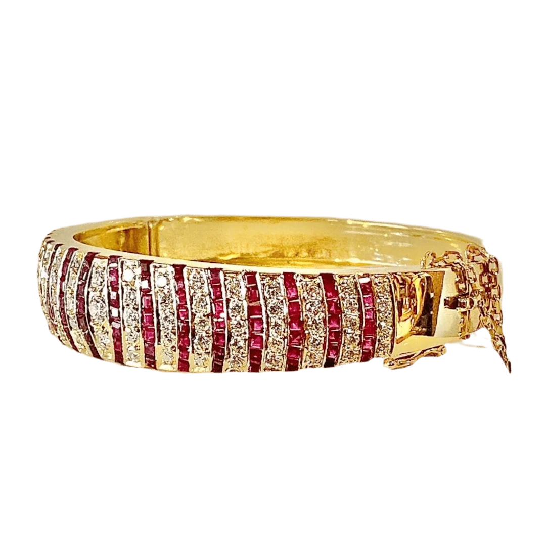 Bracelet rush in yellow gold 18 carats, rubies and diamonds
