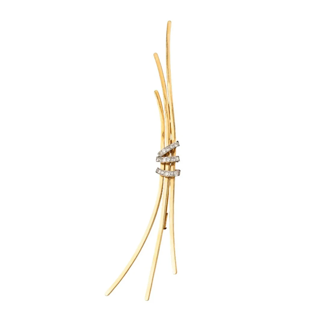 Brooch made up of three yellow gold, white gold and diamonds