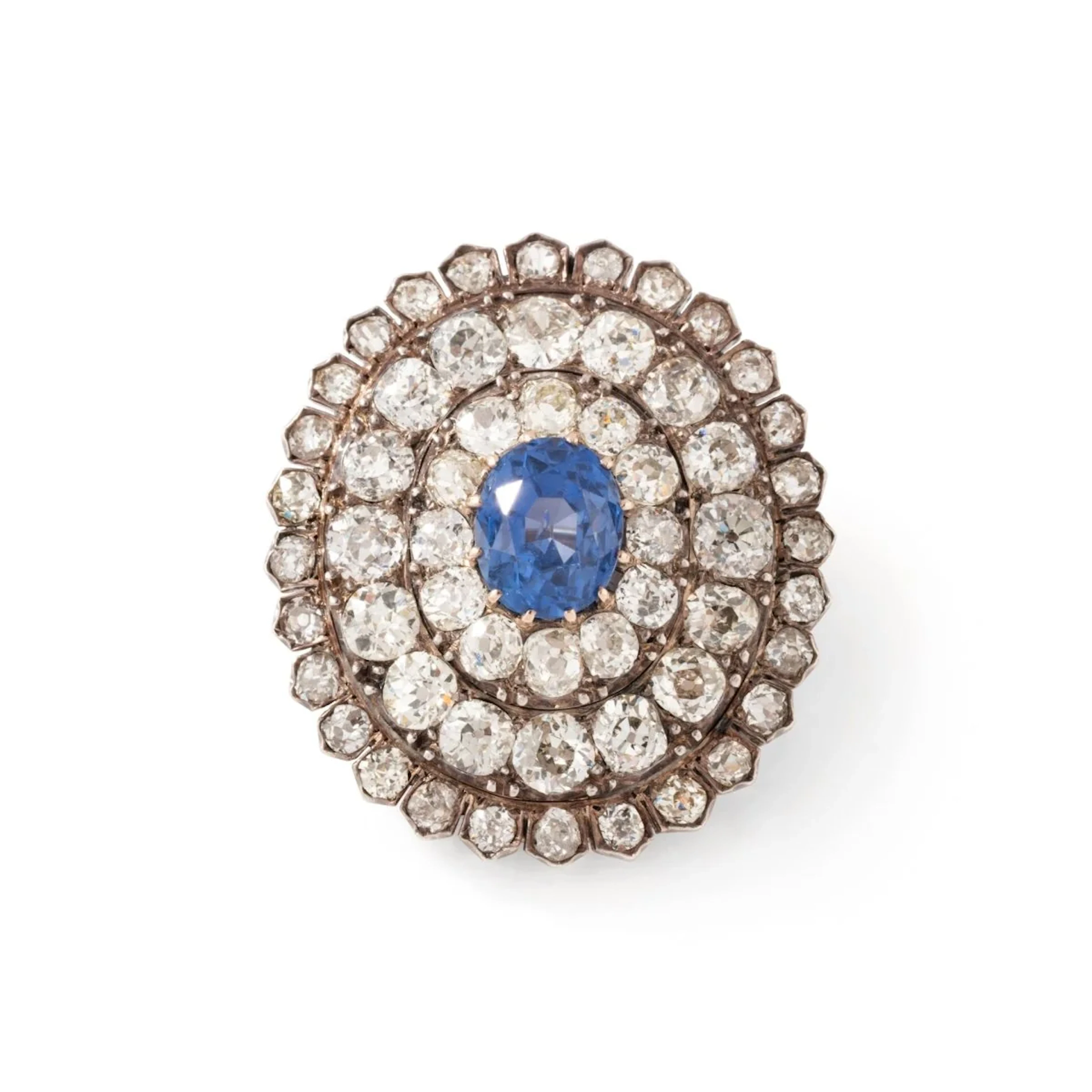 Pin brooch in yellow gold, silver, sapphire and diamonds