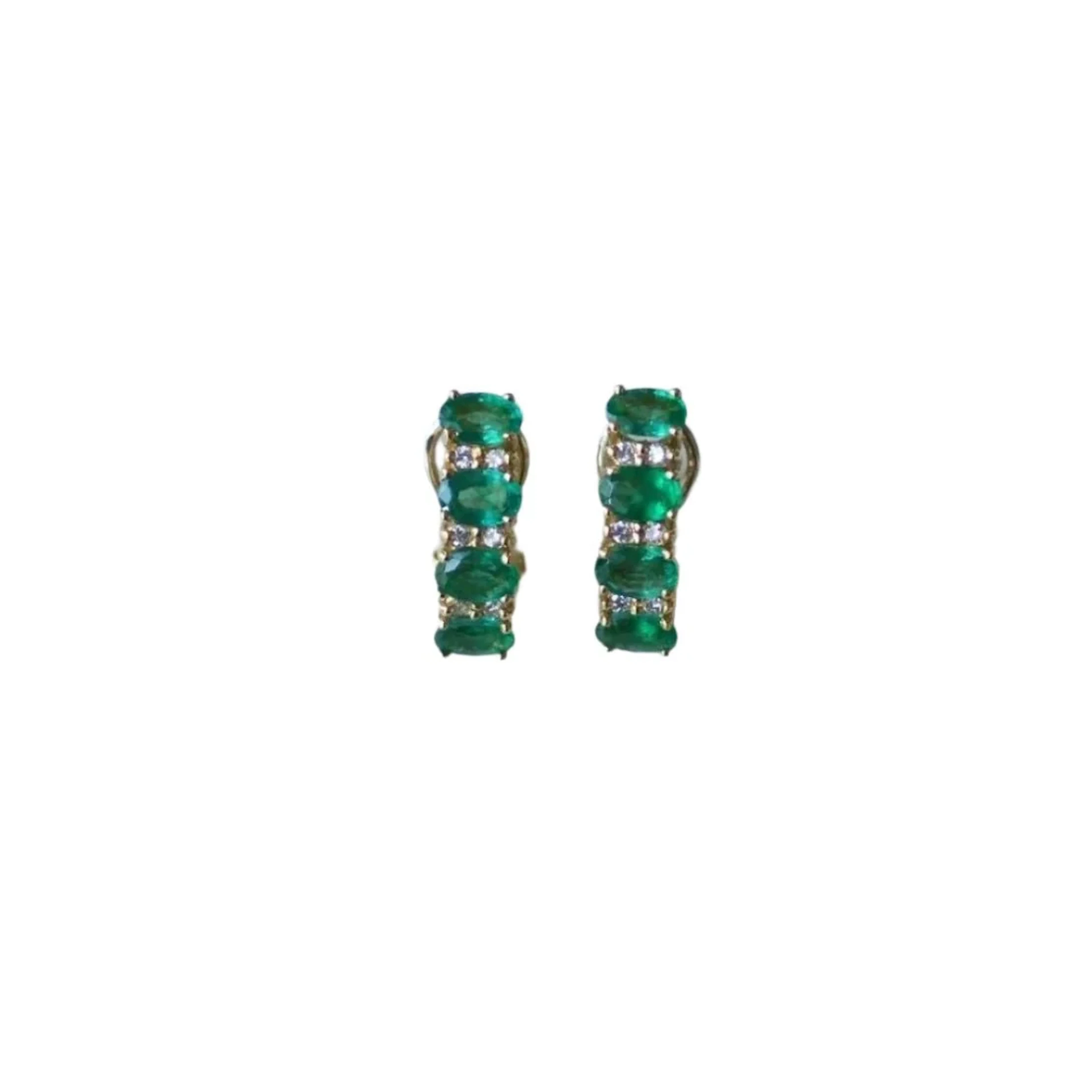 Earrings Clips in yellow gold, emeralds and diamonds