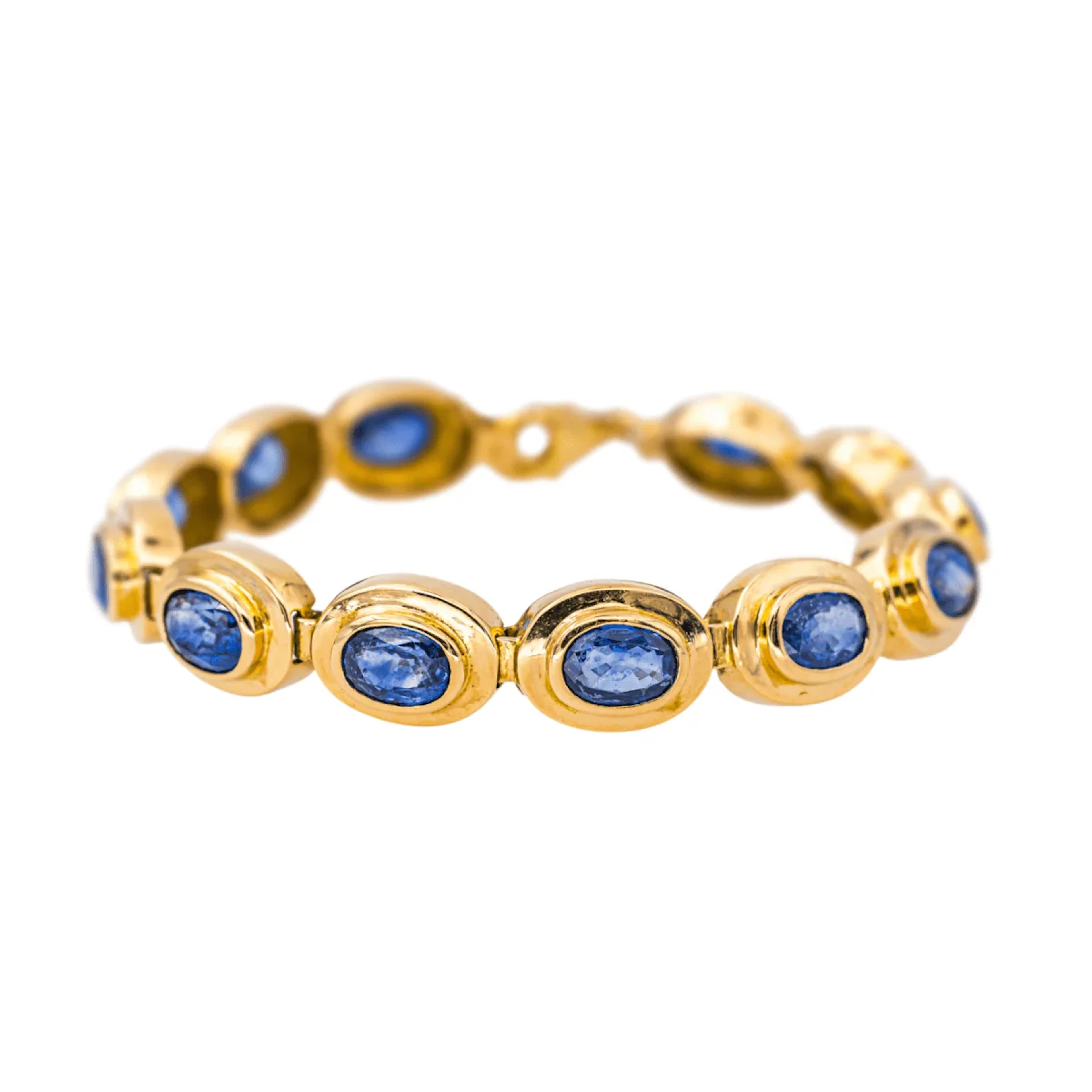 Flexible bracelet in yellow gold and sapphires
