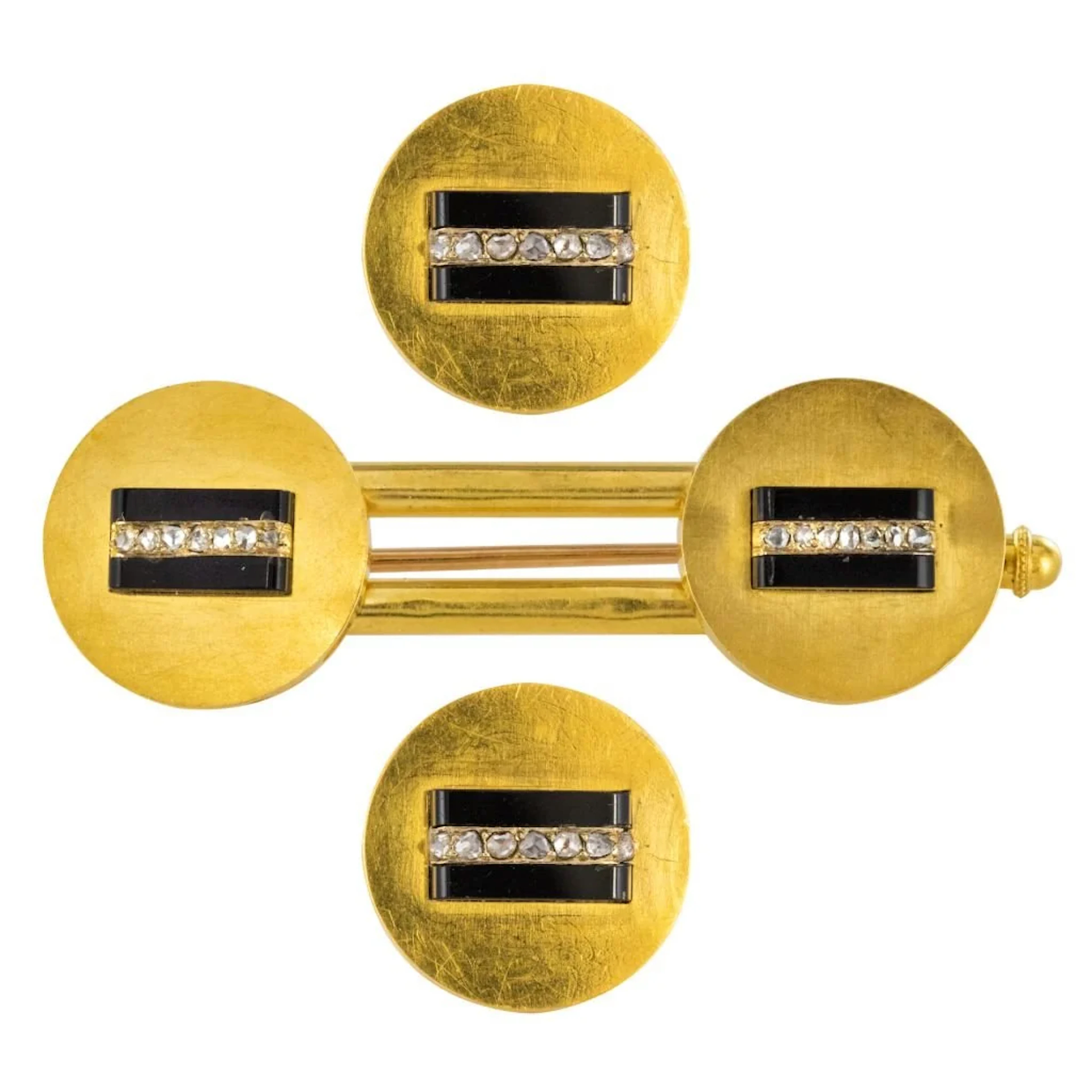 Set in yellow gold, onyx and diamonds
