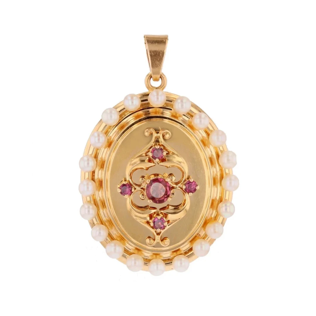 Yellow gold pendant with pearls and garnets