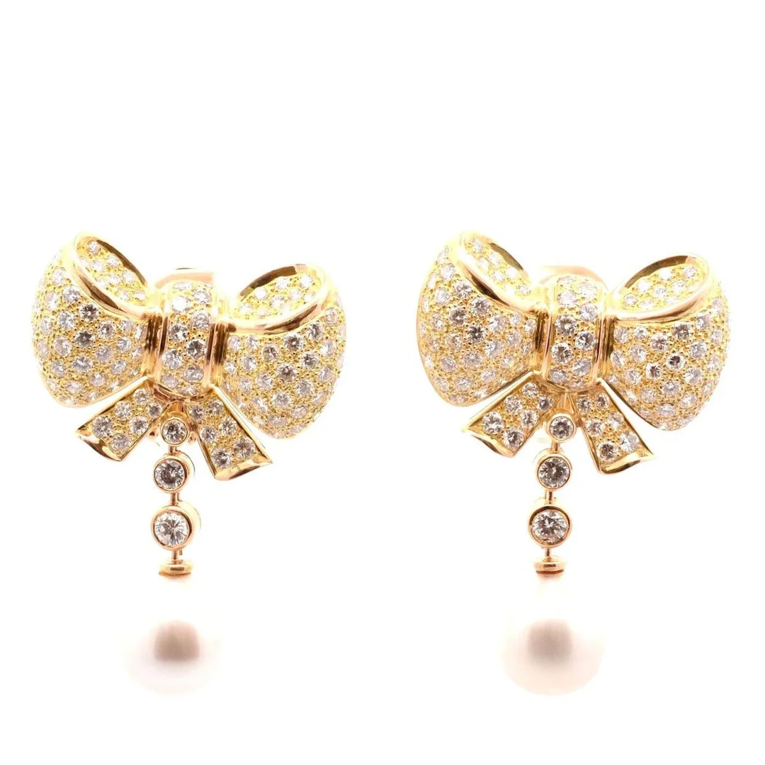 Drop earrings in yellow gold, pearls and diamonds