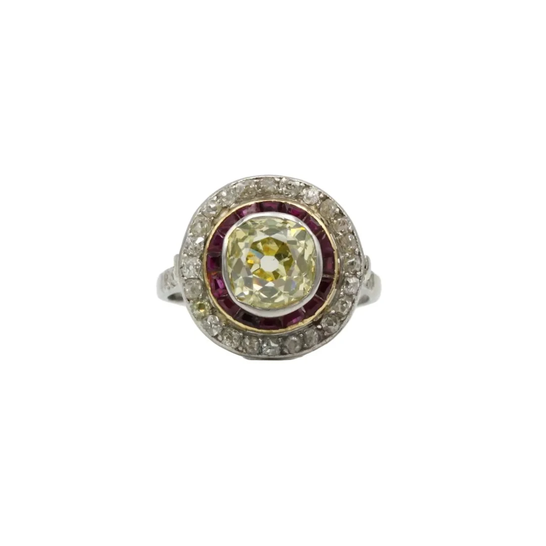 Ring art deco in paltinium and diamond yellow and rubies
