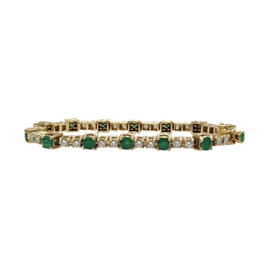 Yellow gold, emerald and diamond line bracelet