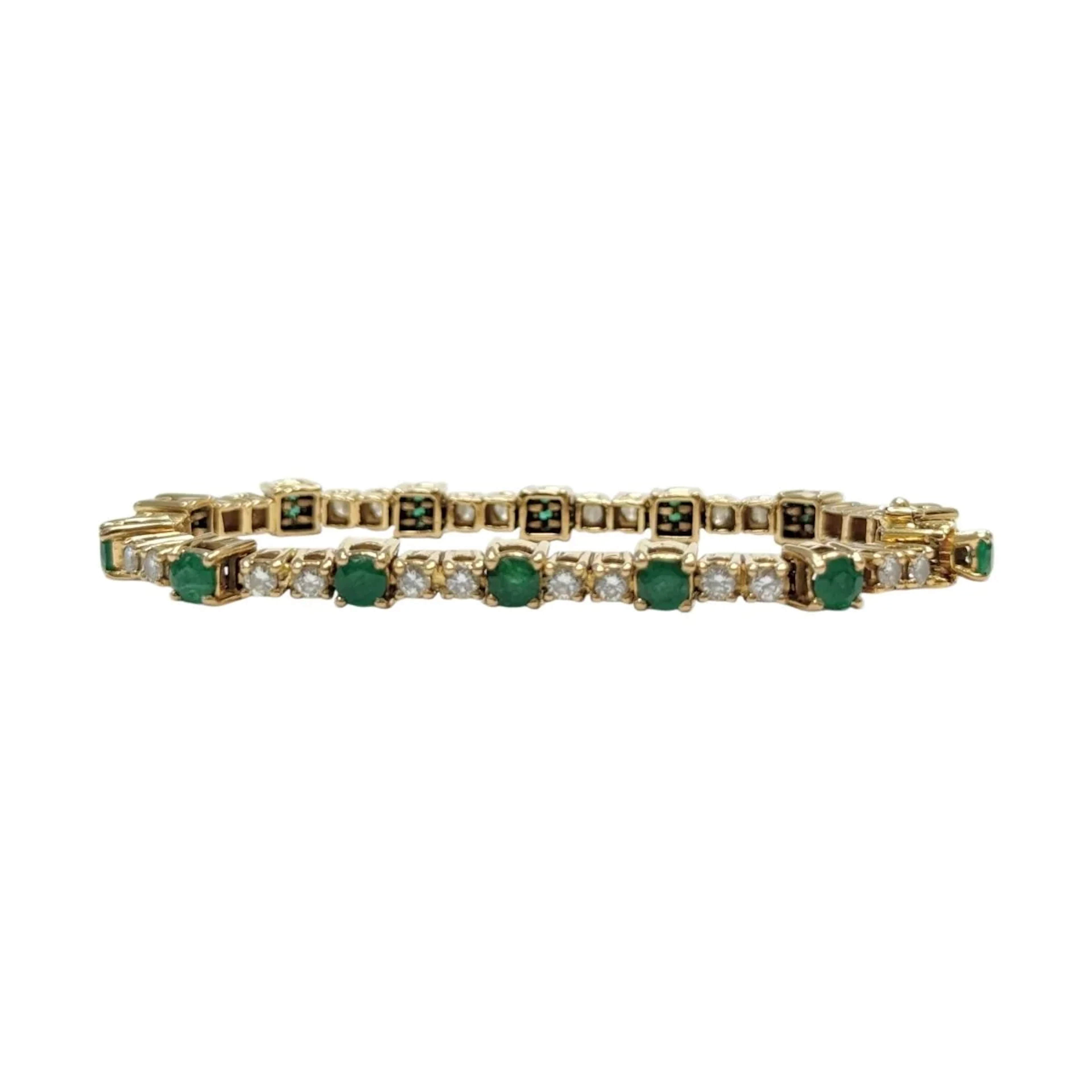 Yellow gold, emerald and diamond line bracelet