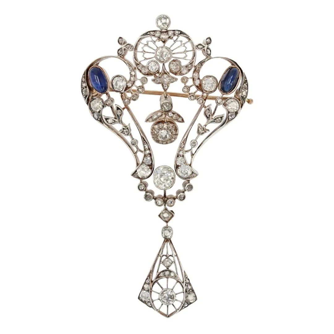 Brooch pin in rose gold, silver, sapphires and diamonds