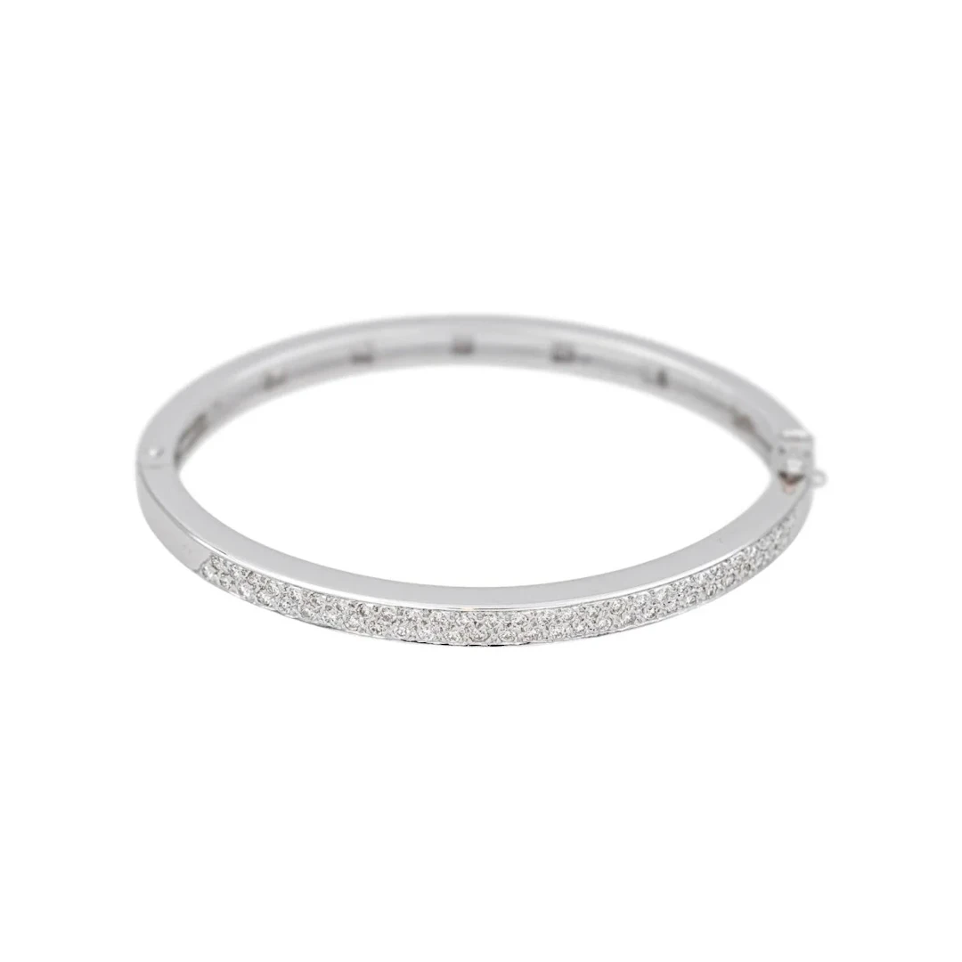 Bangle bracelet in white gold and diamonds