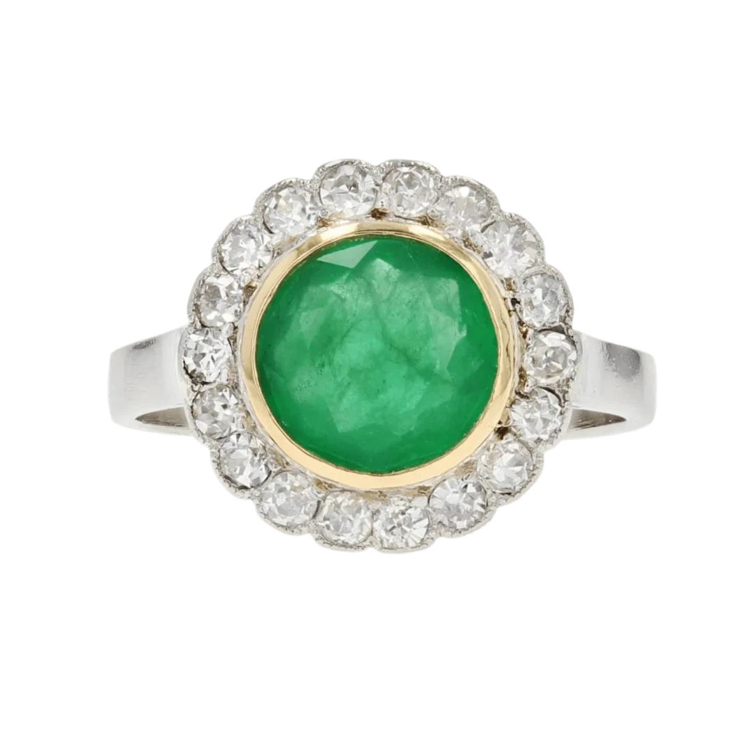 Ring Surroundings in yellow gold, paltinium, emerald and diamonds