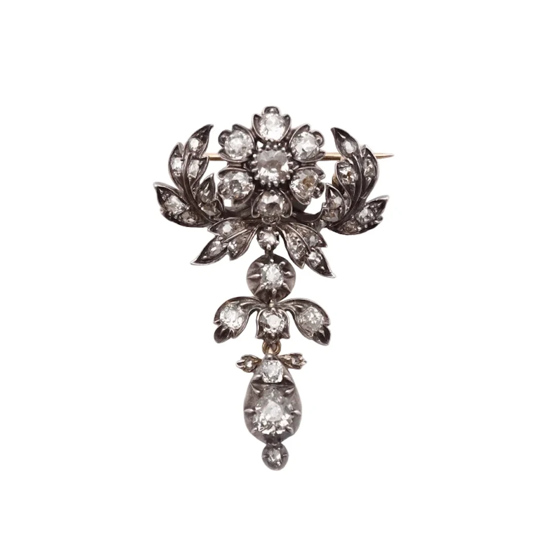 Brooch Pin in yellow gold, silver and diamonds.