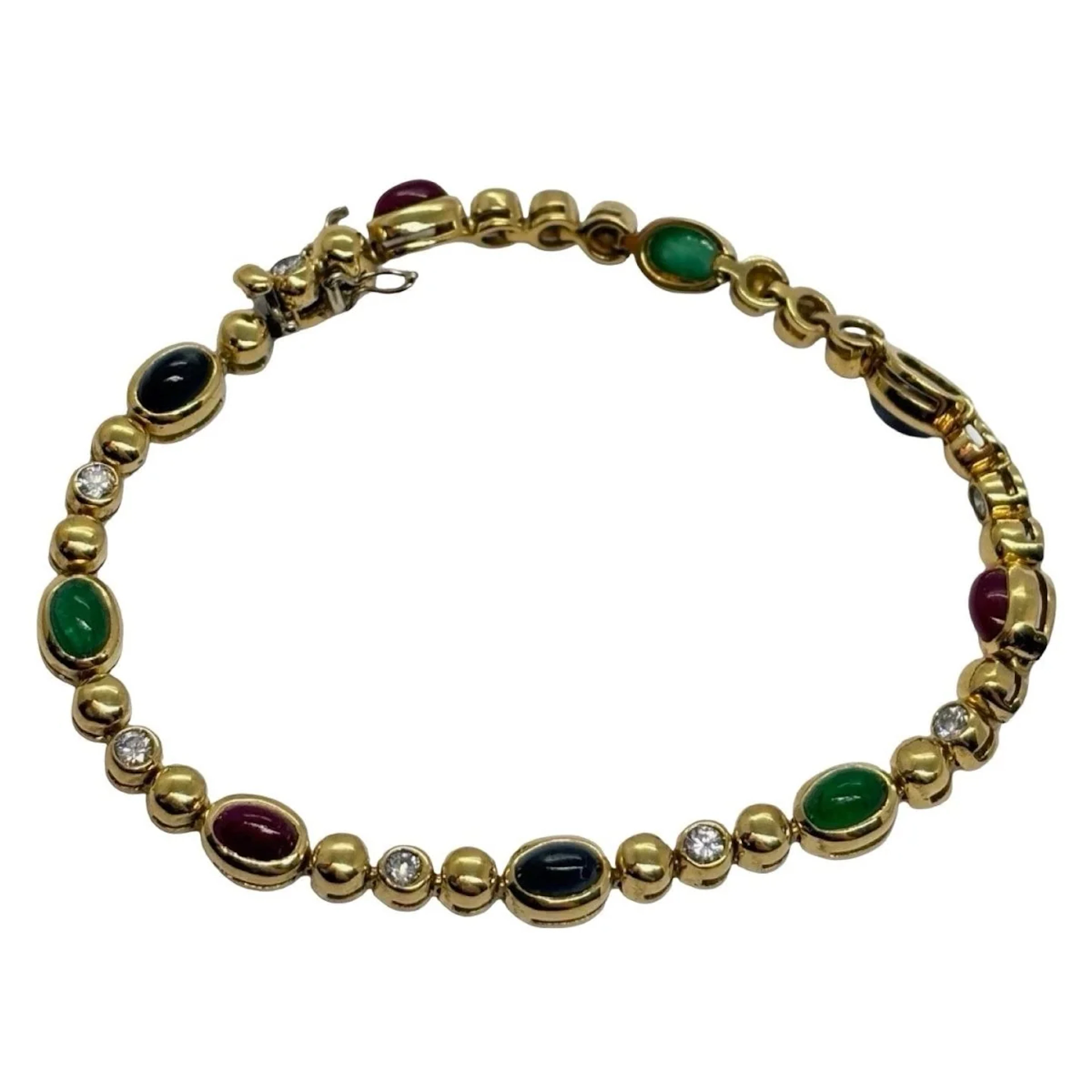 Bracelet Ligne en or jaune, saphirs, émeraudes, rubis et diamants