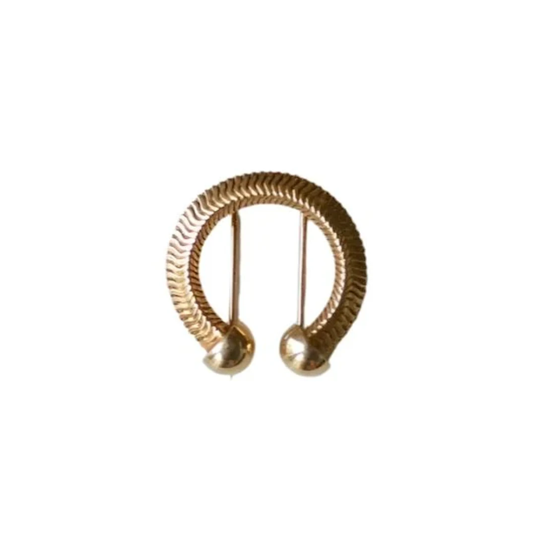 Brooch MELLERIO in yellow gold and pink