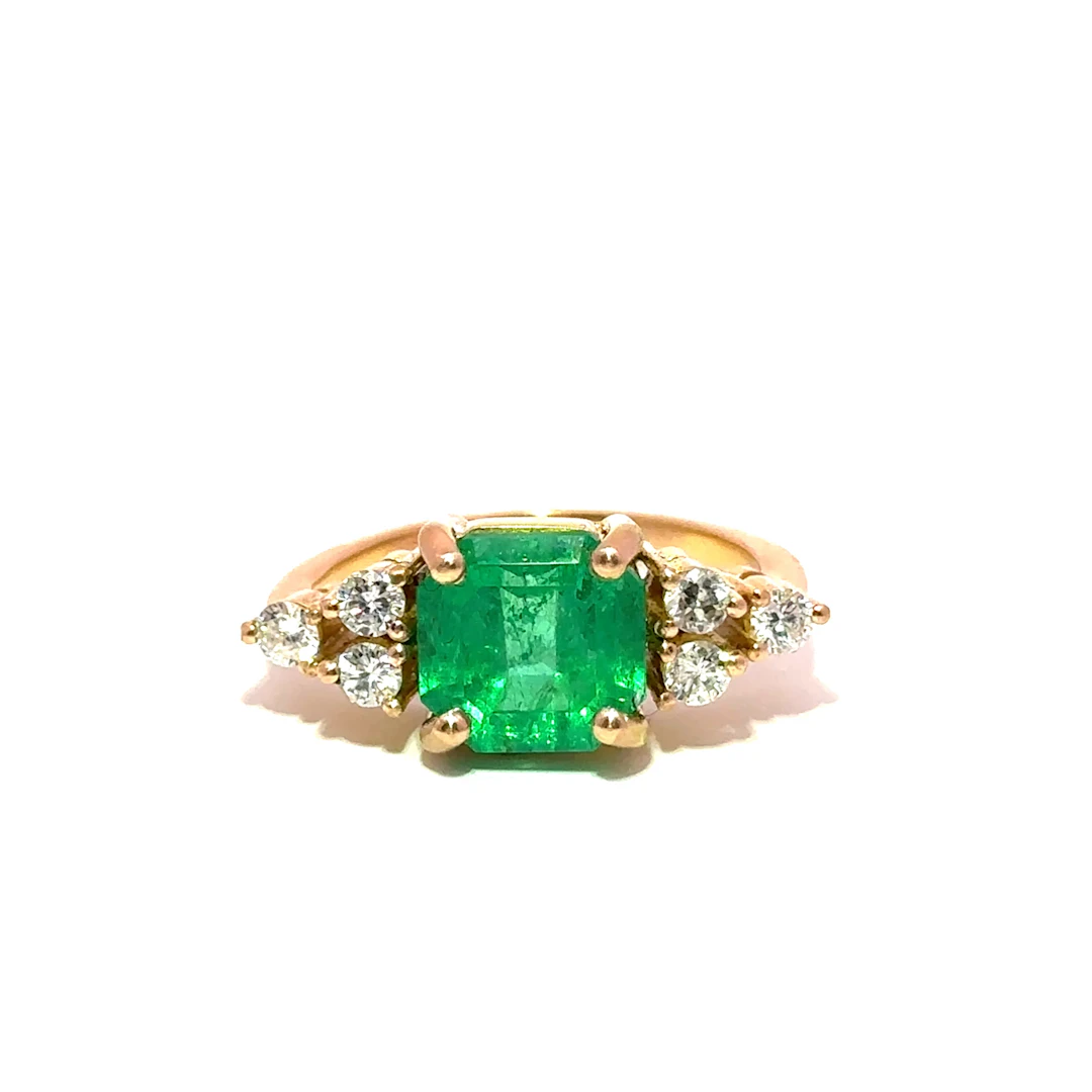 Trilogy Ring in Yellow Gold, Emerald, and Diamonds
