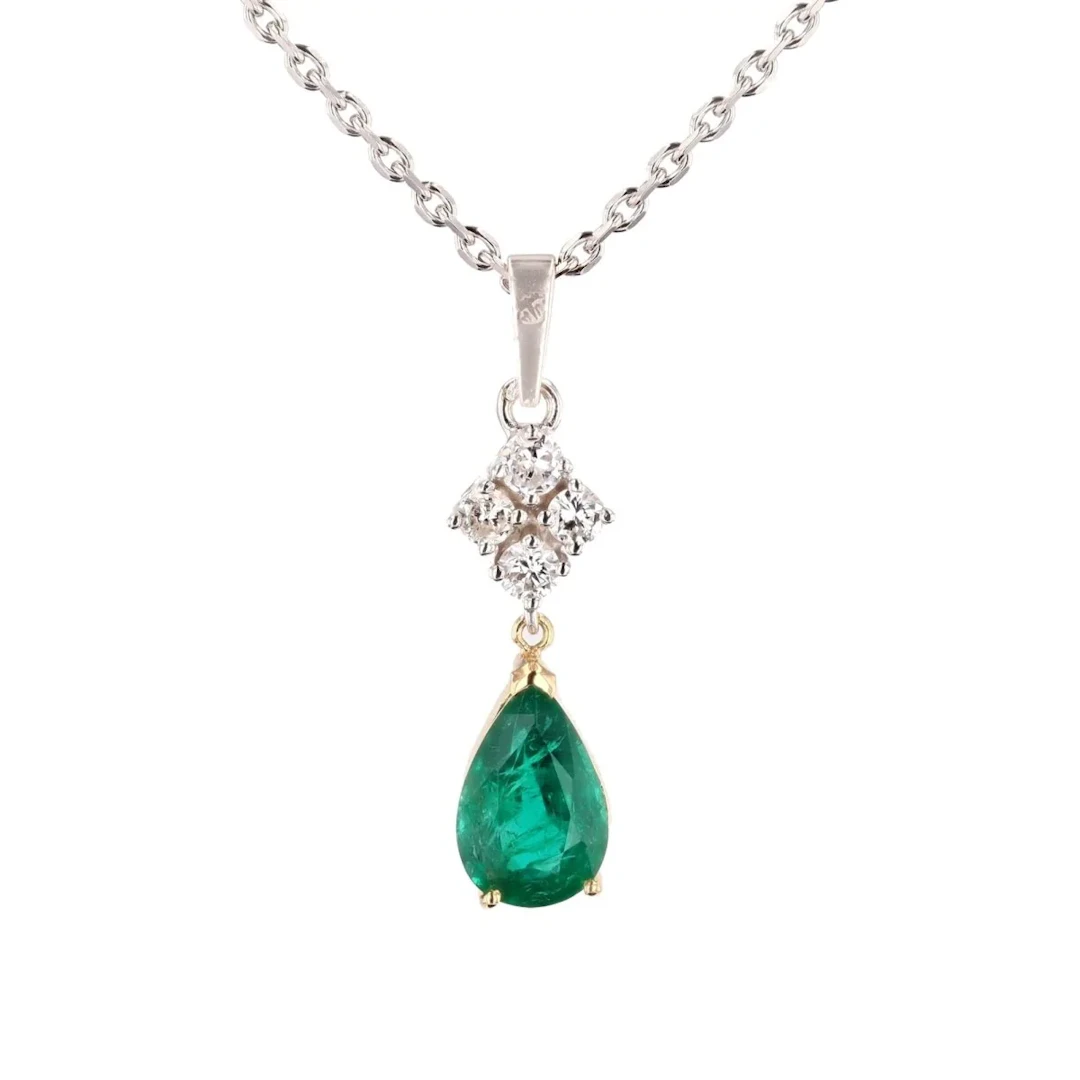 Pendant necklace in white gold, yellow gold, emerald and diamonds