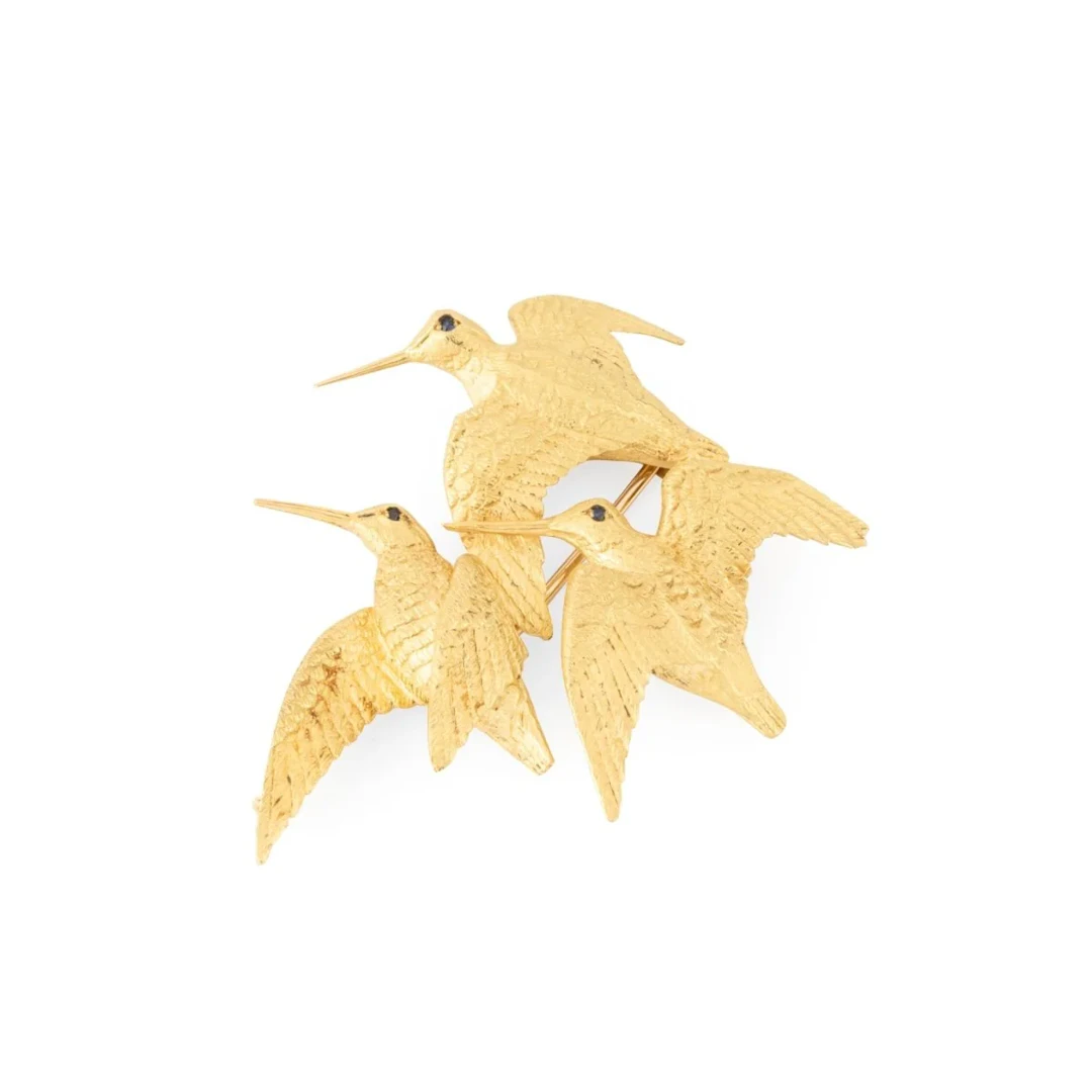HERMÈS by GEORGES LENFANT “Woodcocks” pin brooch in yellow gold and sapphires