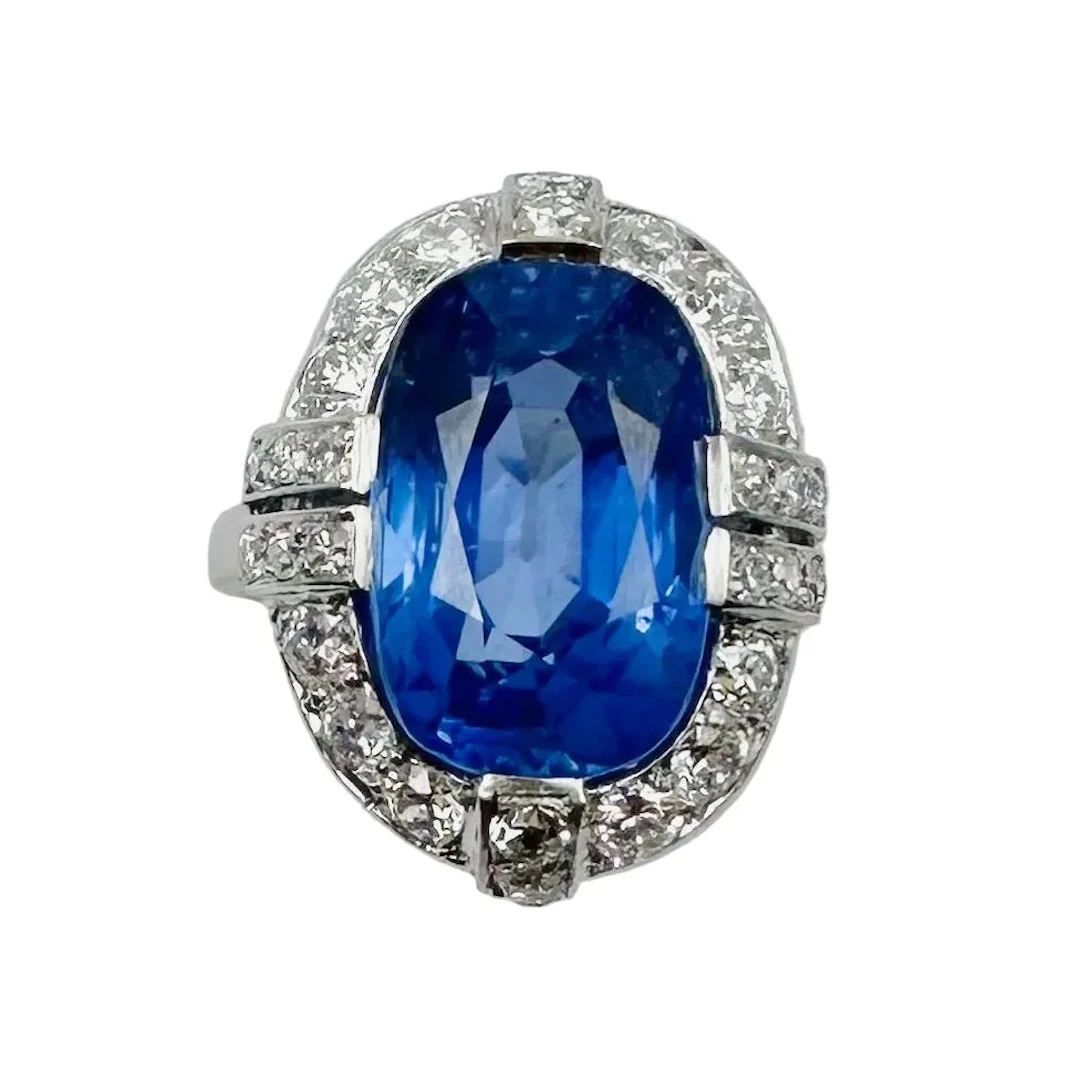 Entourage Ring in platinum, sapphire, and diamonds