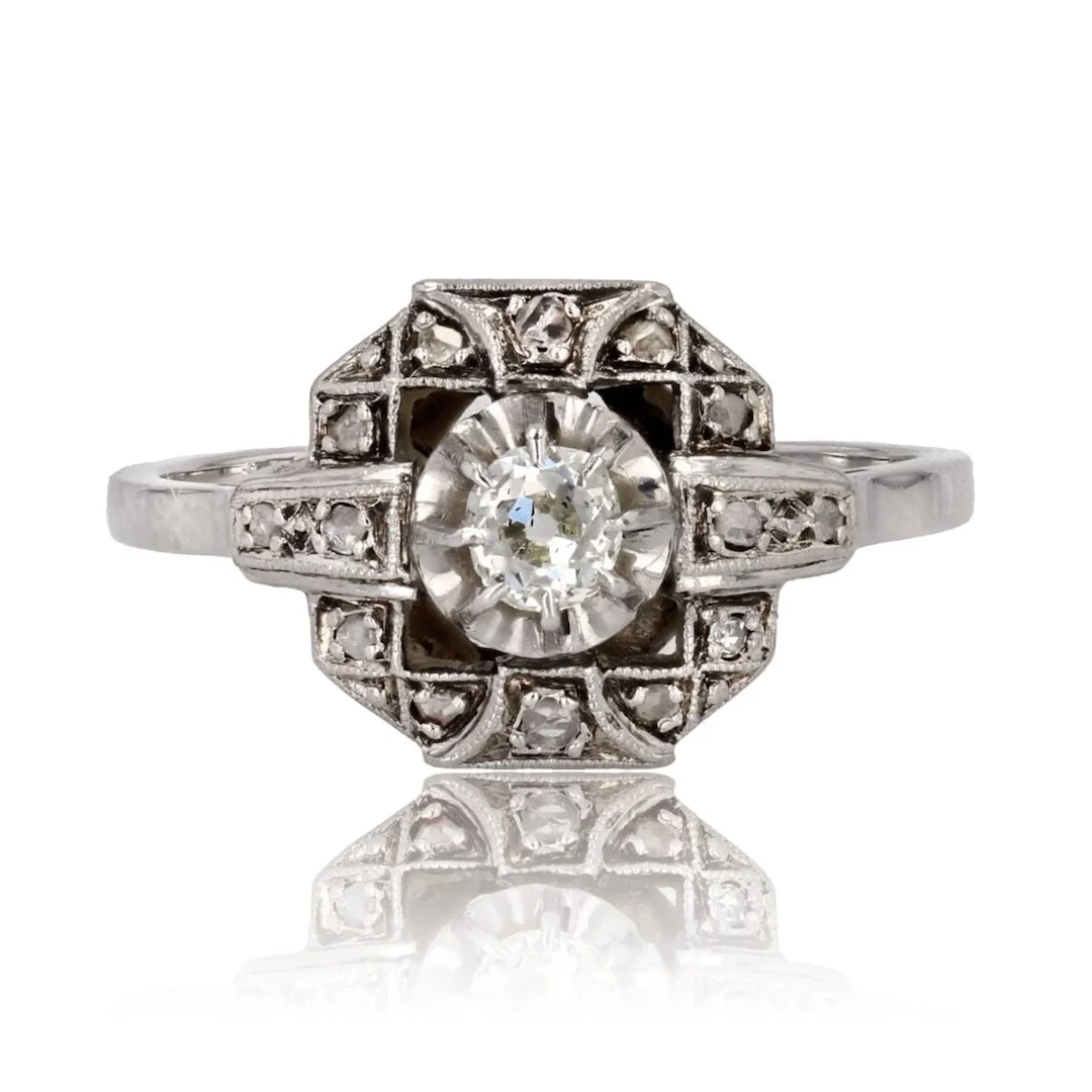 Bague Entourage en or blanc, platine et diamants