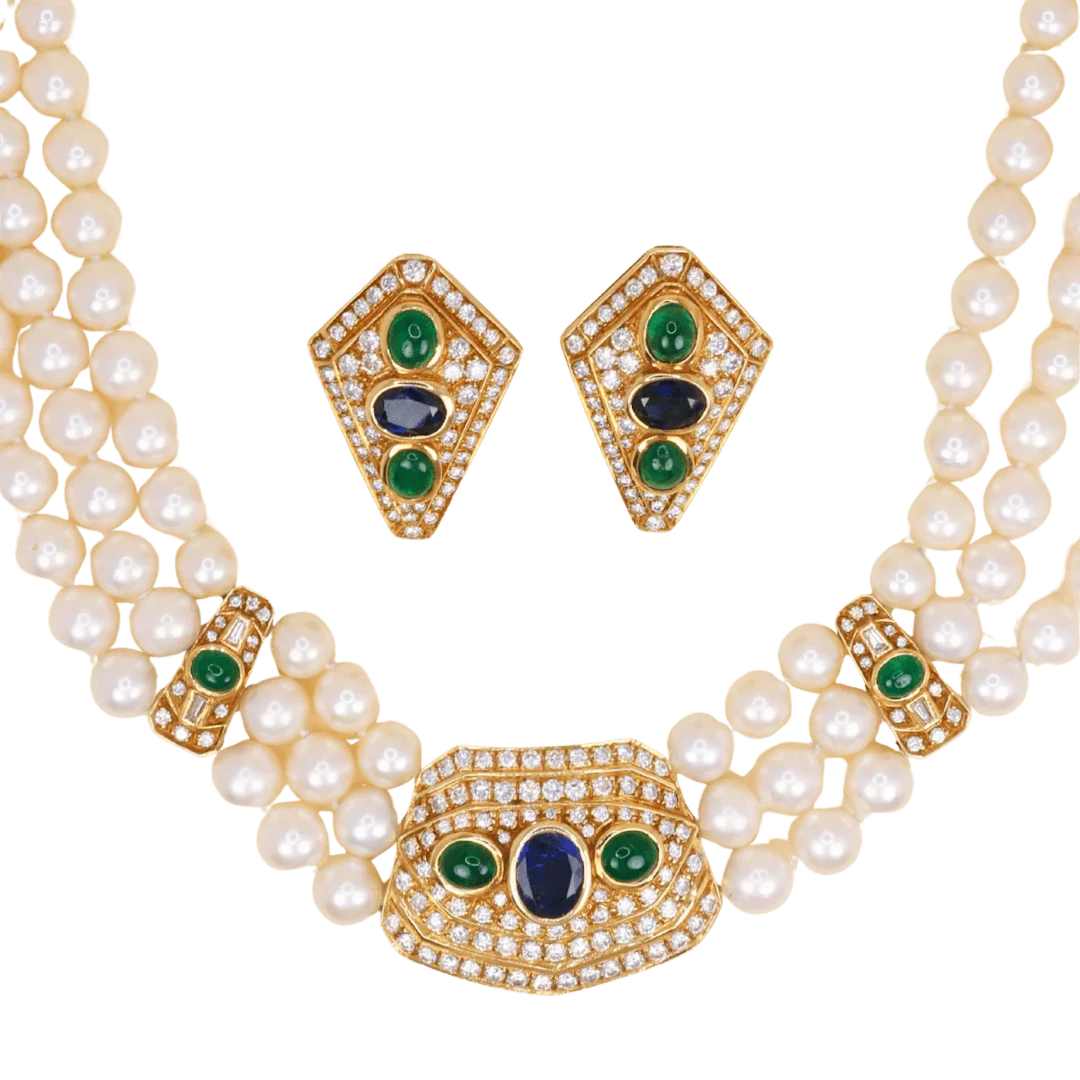 REPOSSI set in yellow gold, with pearls, sapphires, emeralds, and diamonds