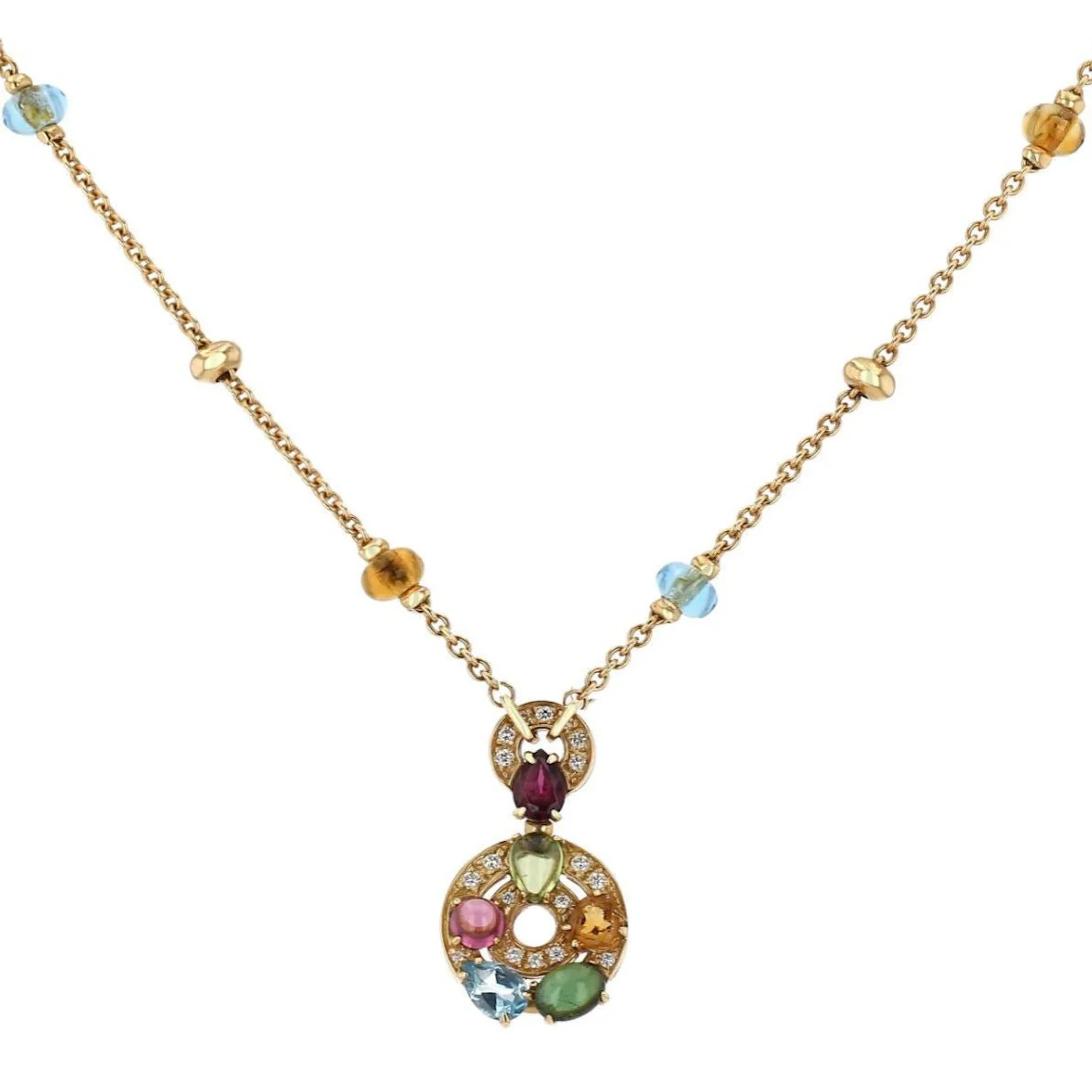 BULGARI “Astrale” pendant necklace in yellow gold, garnet, topaz