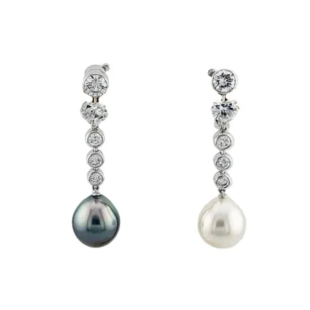 CARTIER Drop Earrings in platinum, pearls, and diamonds