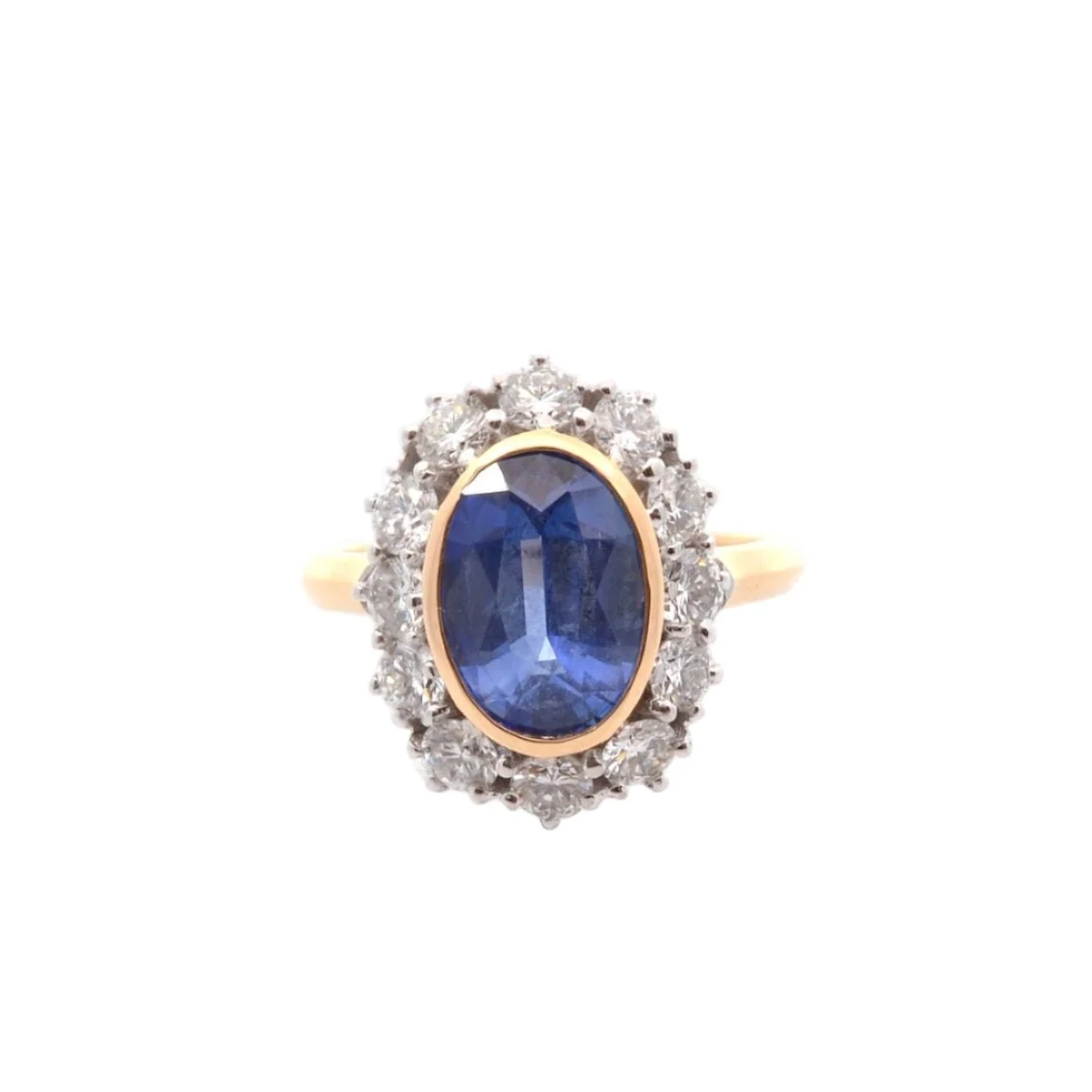 Daisy ring in yellow gold, platinum, sapphire, and diamonds