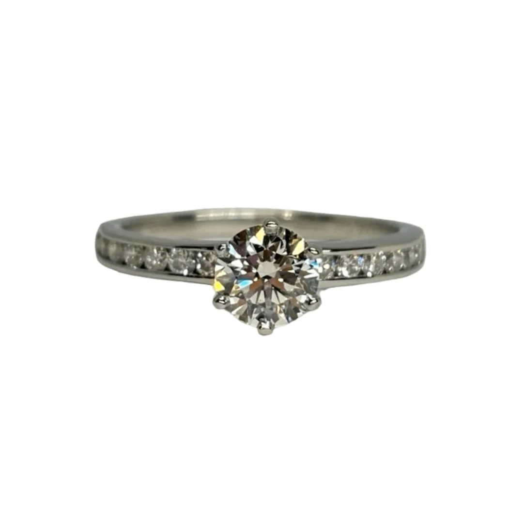 TIFFANY & CO. Solitaire Ring in Platinum and Diamonds
