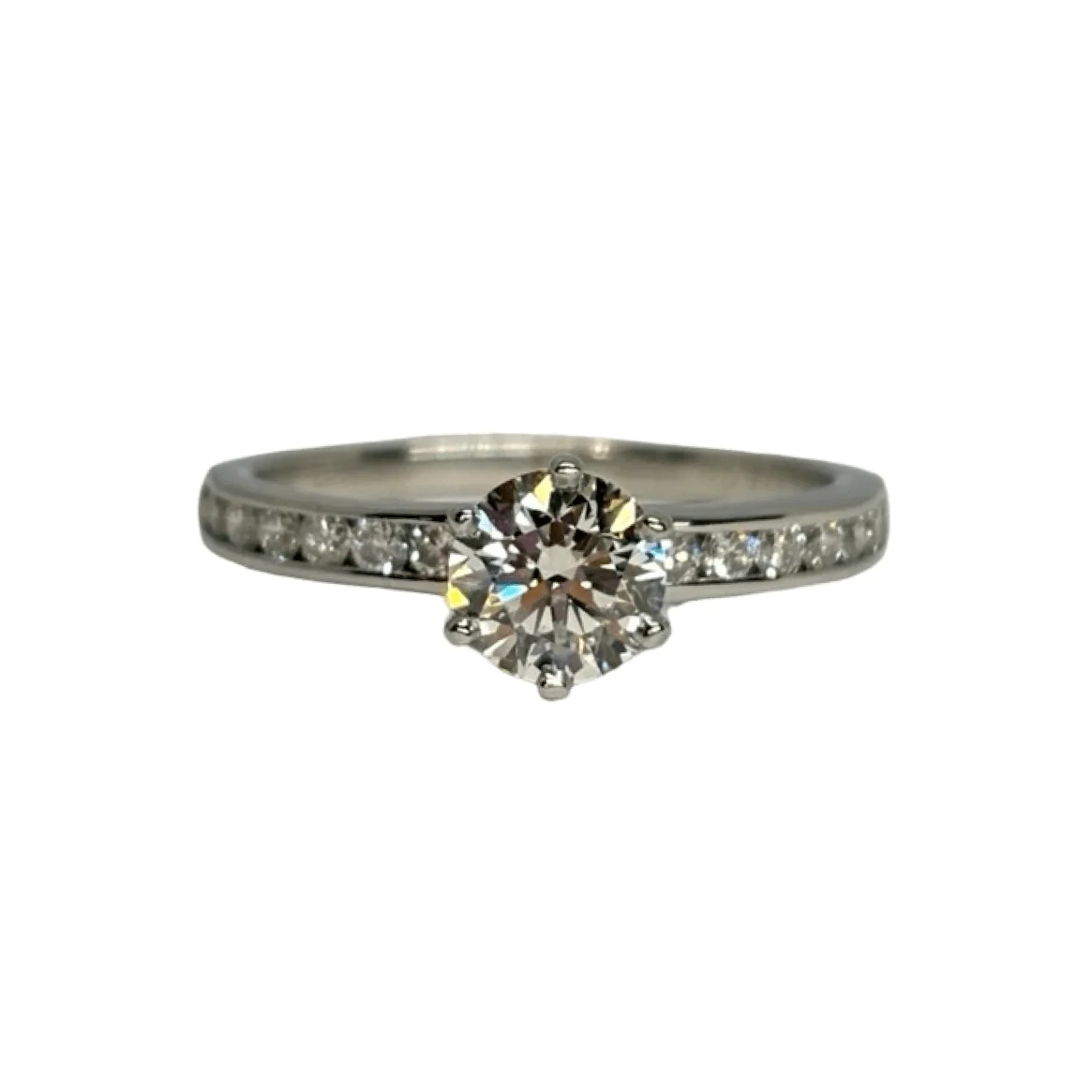 TIFFANY & CO. Solitaire Ring in Platinum and Diamonds