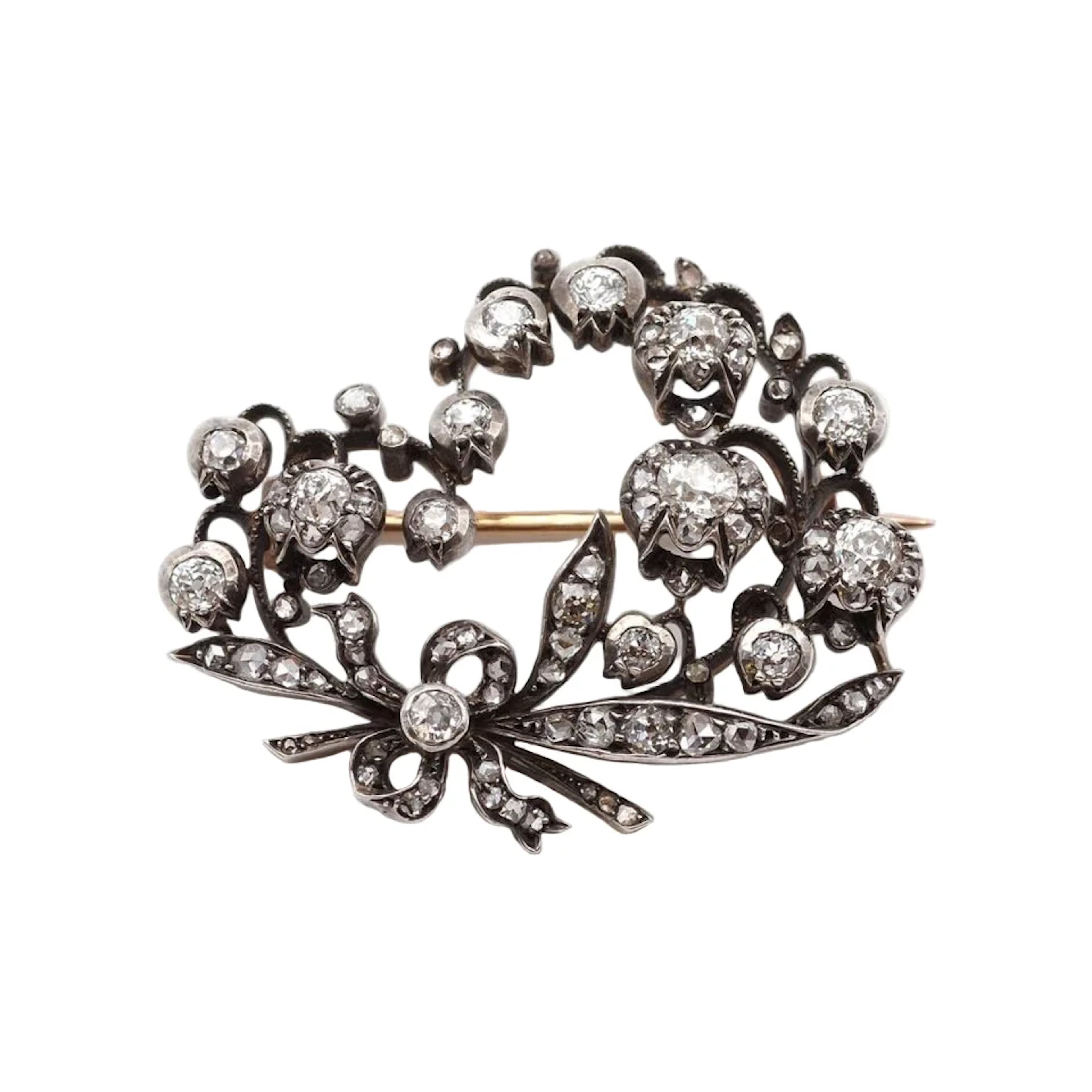 Gold, silver and diamond brooch pin