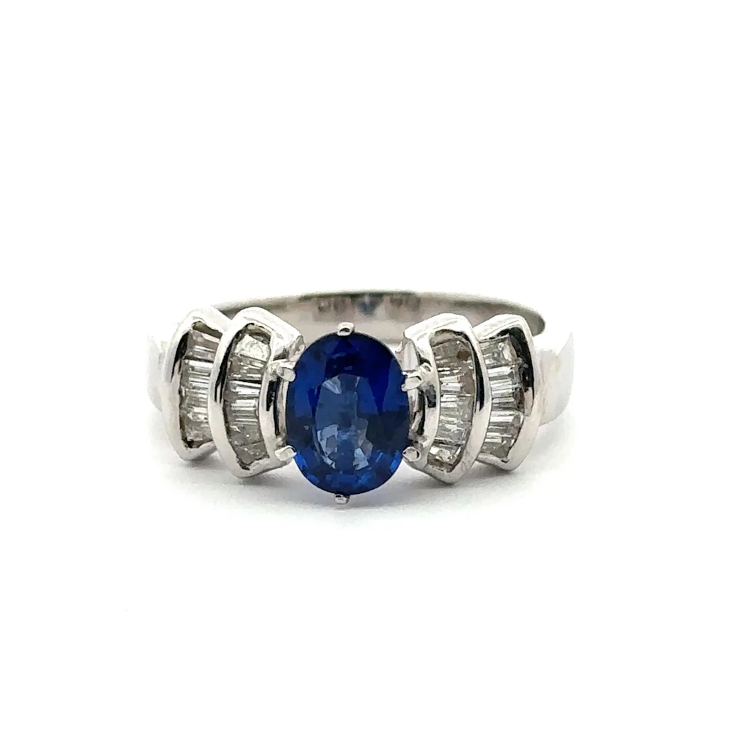 White gold ring with a sapphire and diamonds