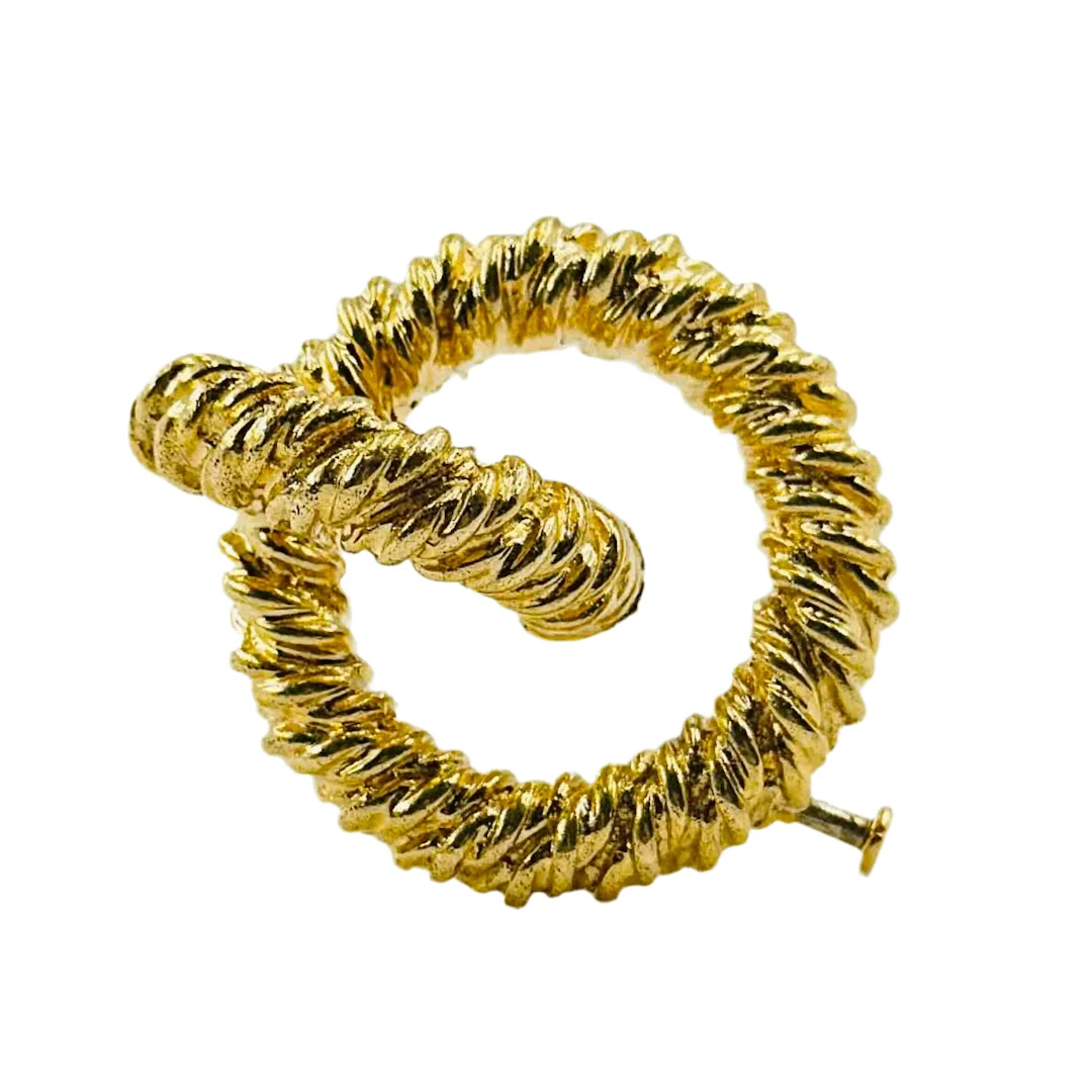 Brooch HERMES in yellow gold twisted