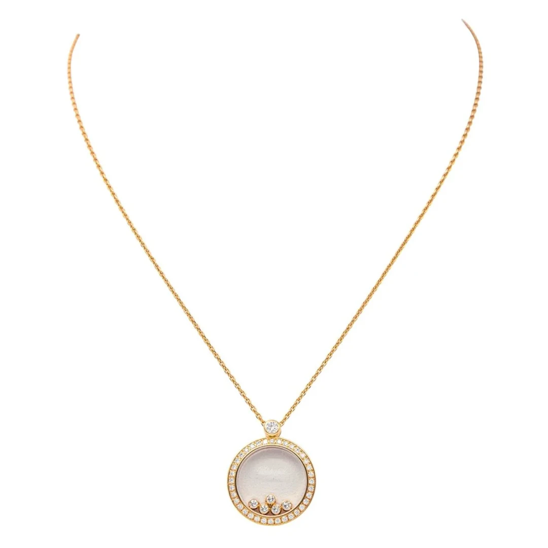 Collier Pendentif CHOPARD "Happy Diamonds Icons" en or rose, saphir et diamants
