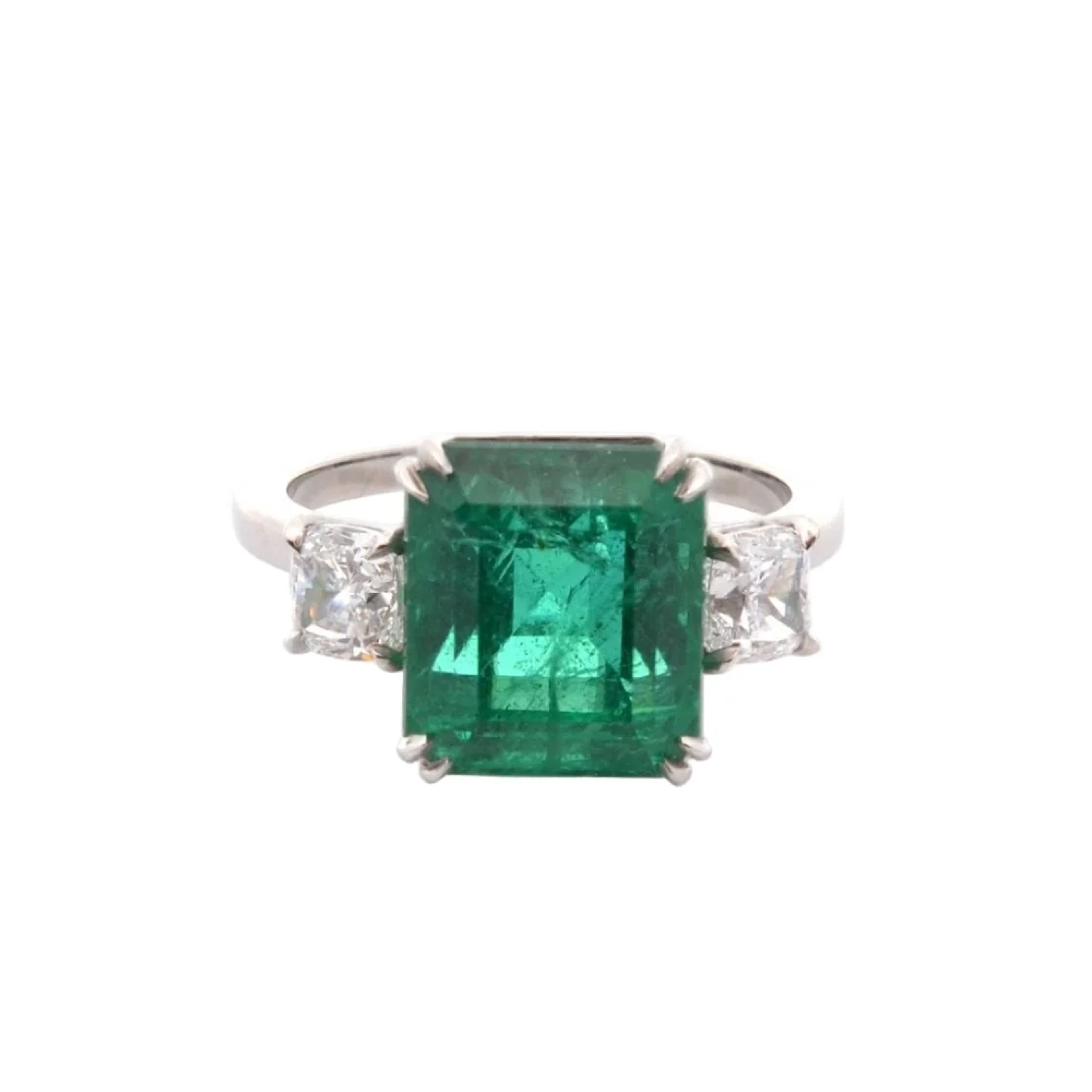 Trilogy ring in platinum, emeralds, and diamonds