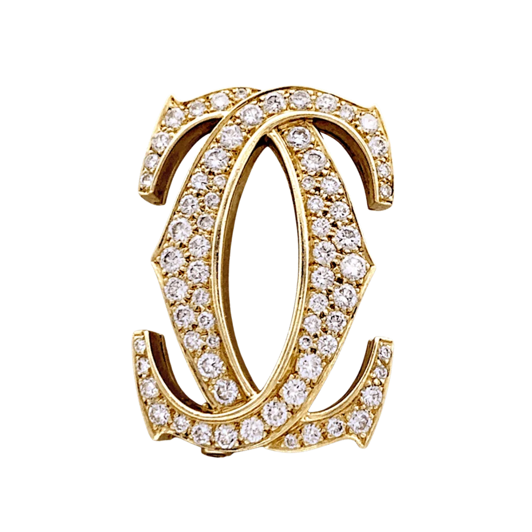 CARTIER "Double C" Brooch in Yellow gold and Diamonds