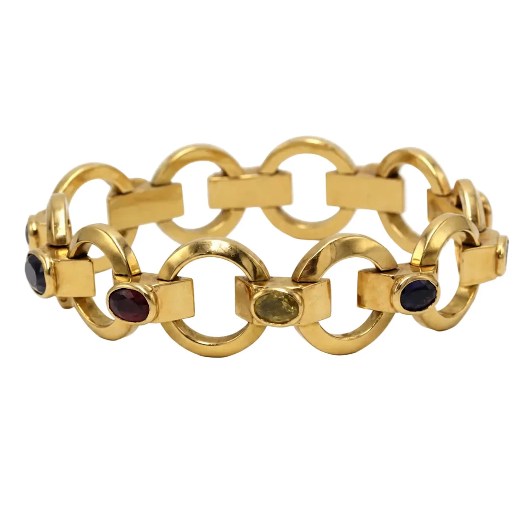 Tank bracelet in yellow gold, garnets, Spinels, zircons, and iolite