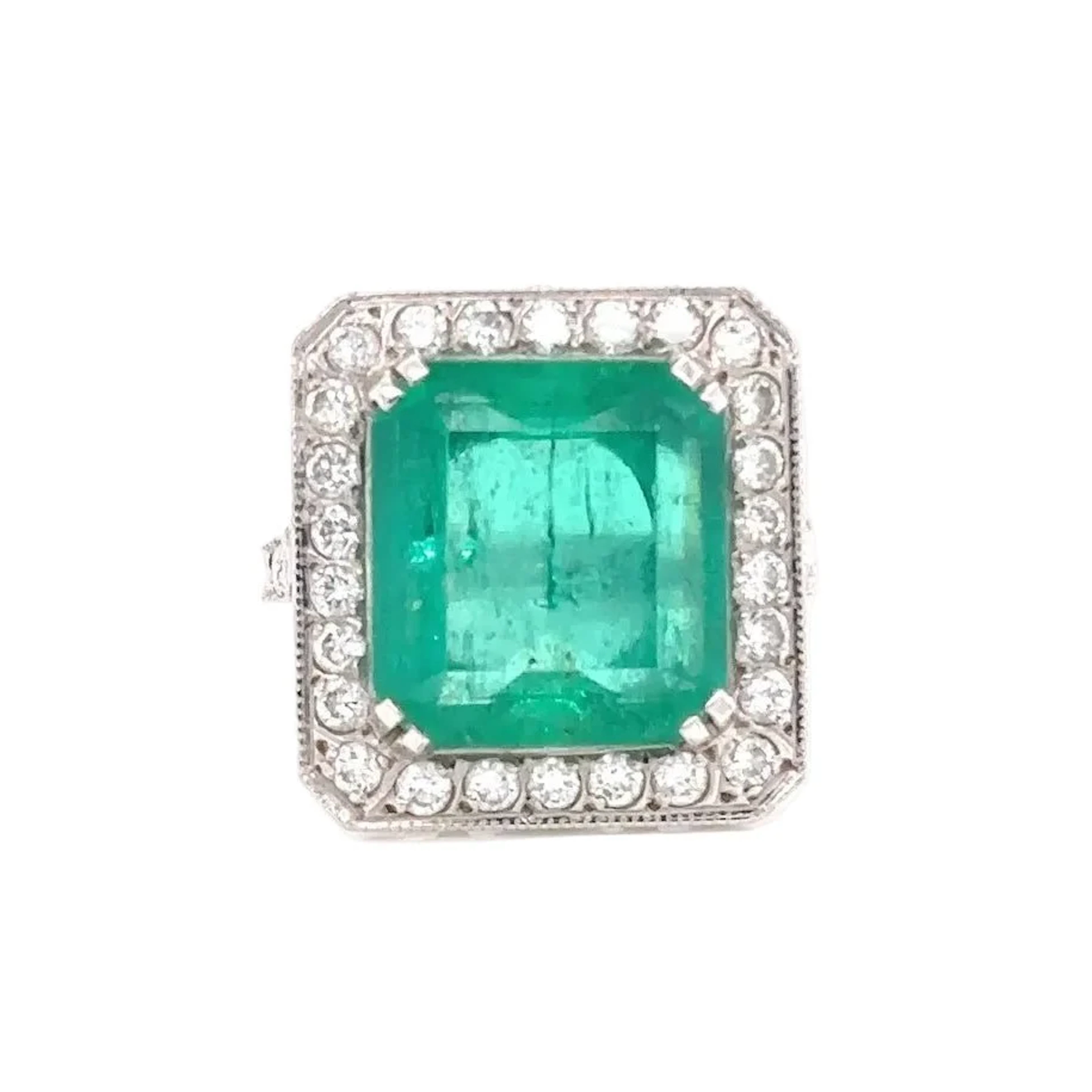 "Entourage" Ring in White Gold, Emerald, and Diamonds