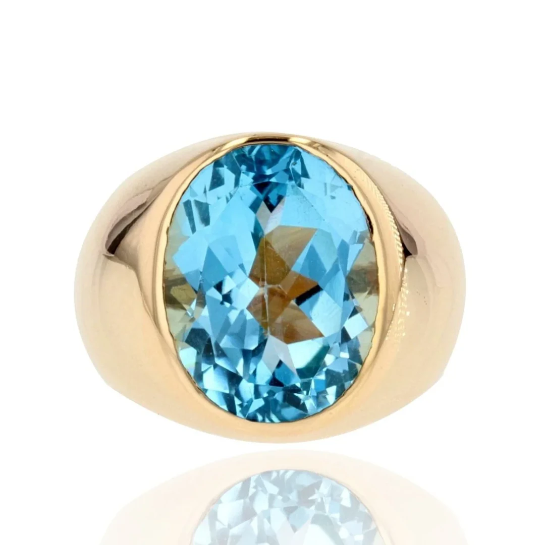 Bague Jonc en or jaune et topaze