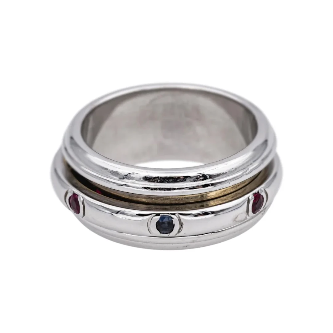 PIAGET "Possession" wedding ring in white gold, rubies, emeralds and sapphires