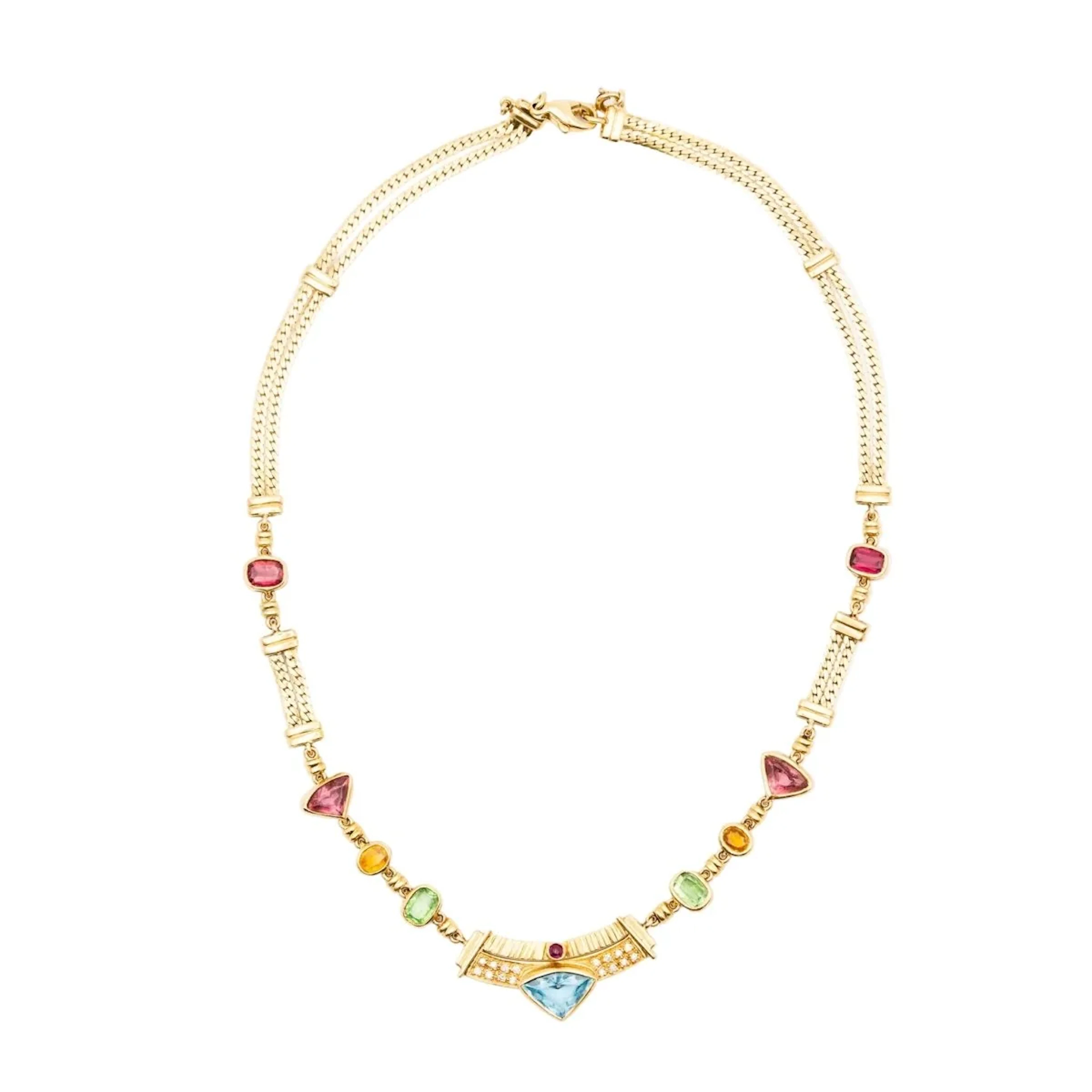 Yellow gold necklace with citrines, garnets, peridots, blue topaz