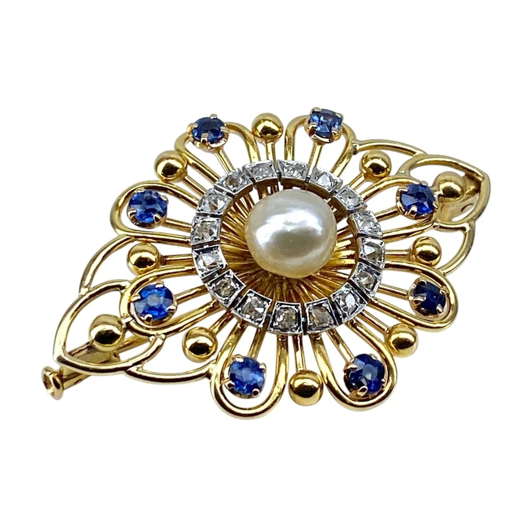 Gold brooch with sapphires, a pearl, and diamonds