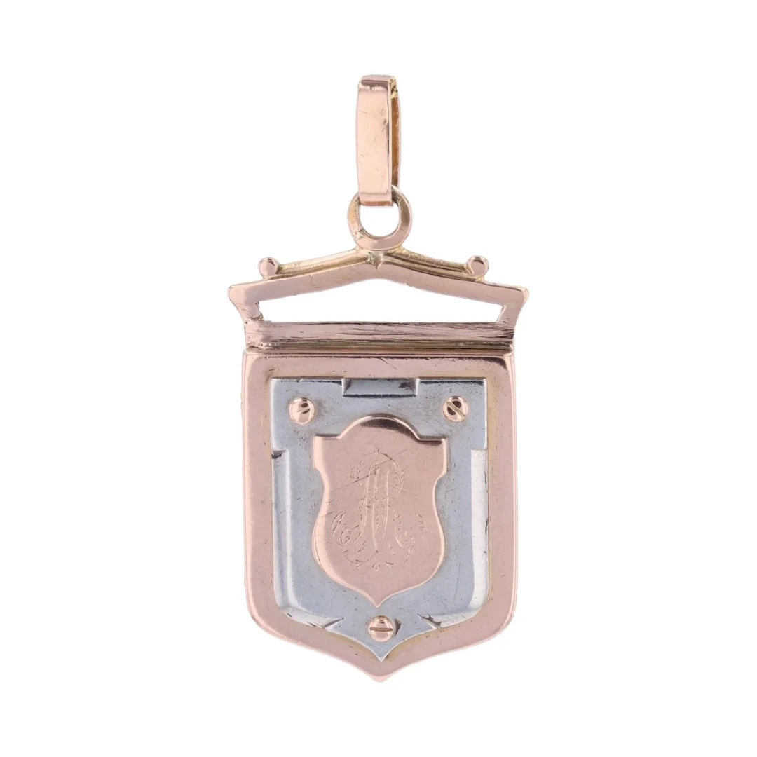 Antique medallion pendant with rose gold and white gold escutcheon