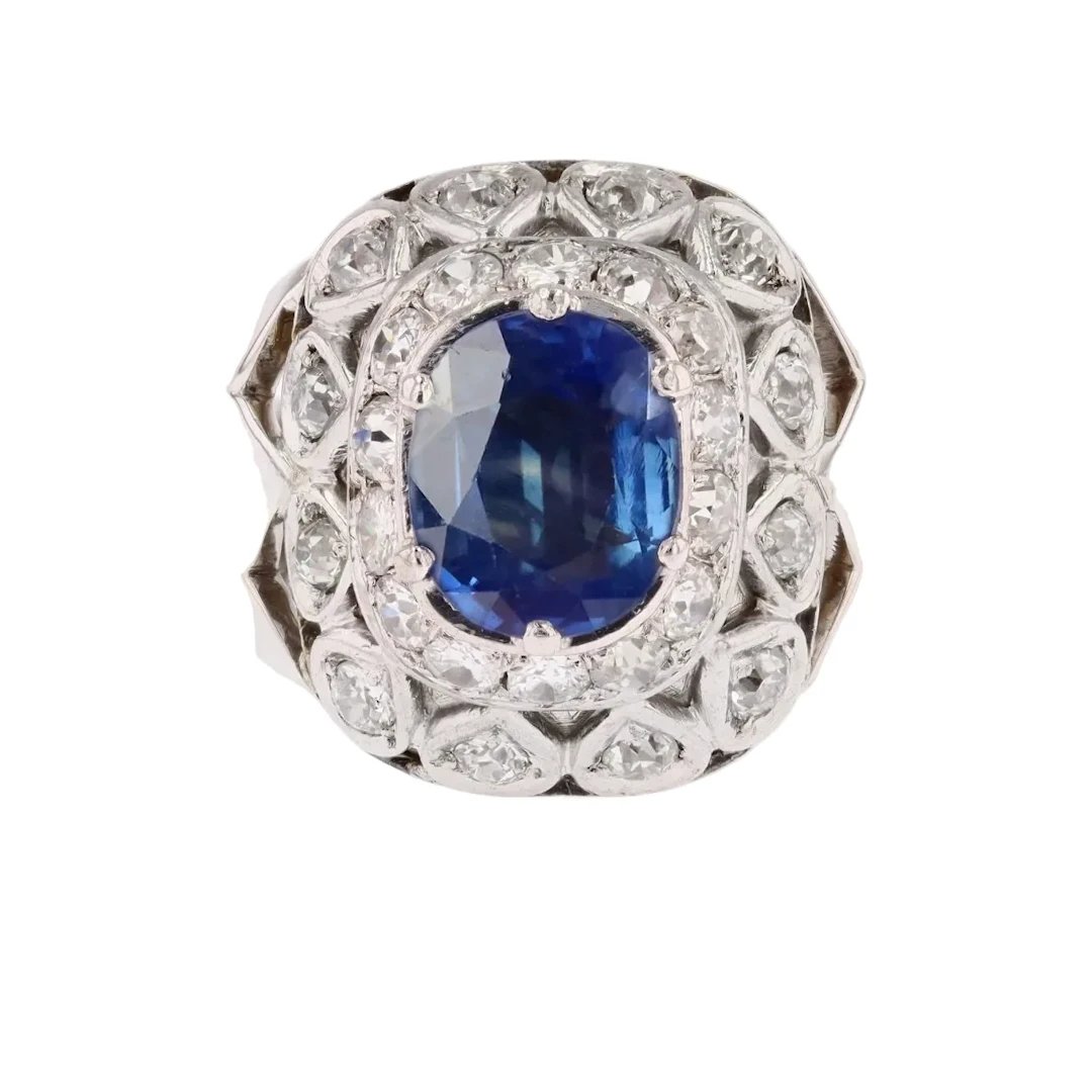 Dome ring in white gold, platinum, sapphire and diamonds