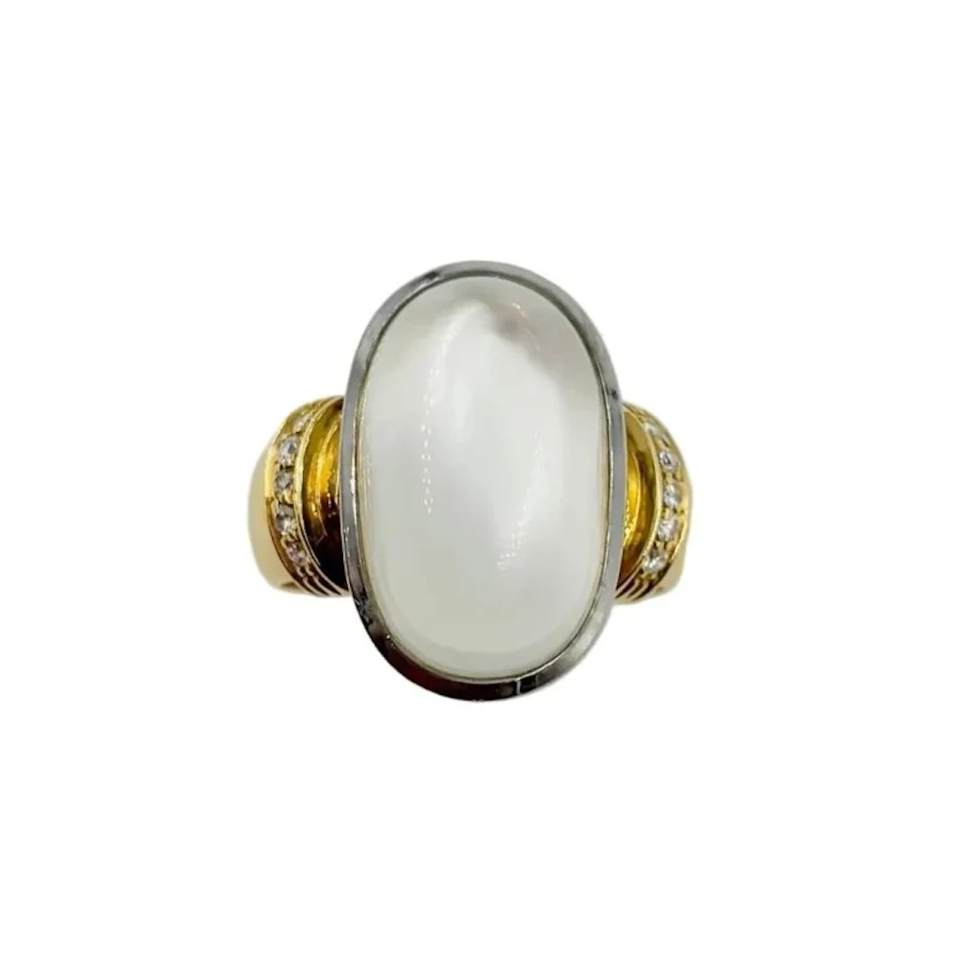 Solitaire Ring in yellow gold, white gold, moonstone, and diamonds