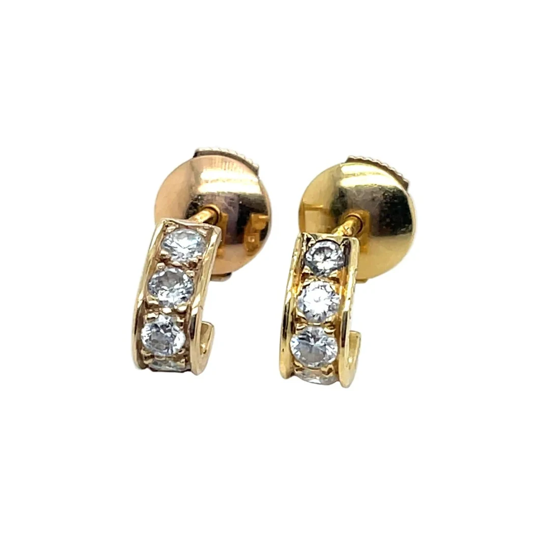 Van Cleef & Arpels hoop earrings in yellow gold and diamonds.
