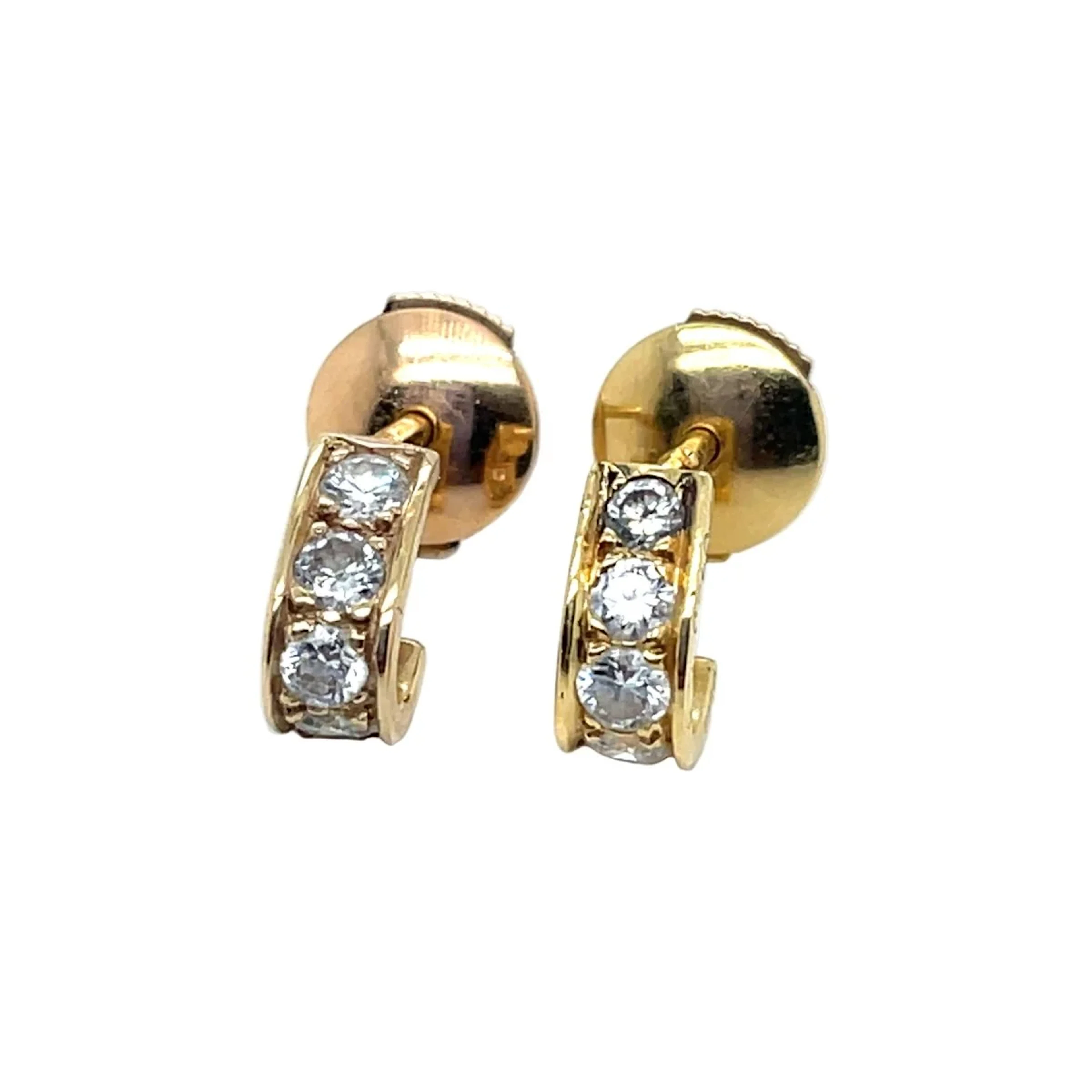 Van Cleef & Arpels hoop earrings in yellow gold and diamonds.